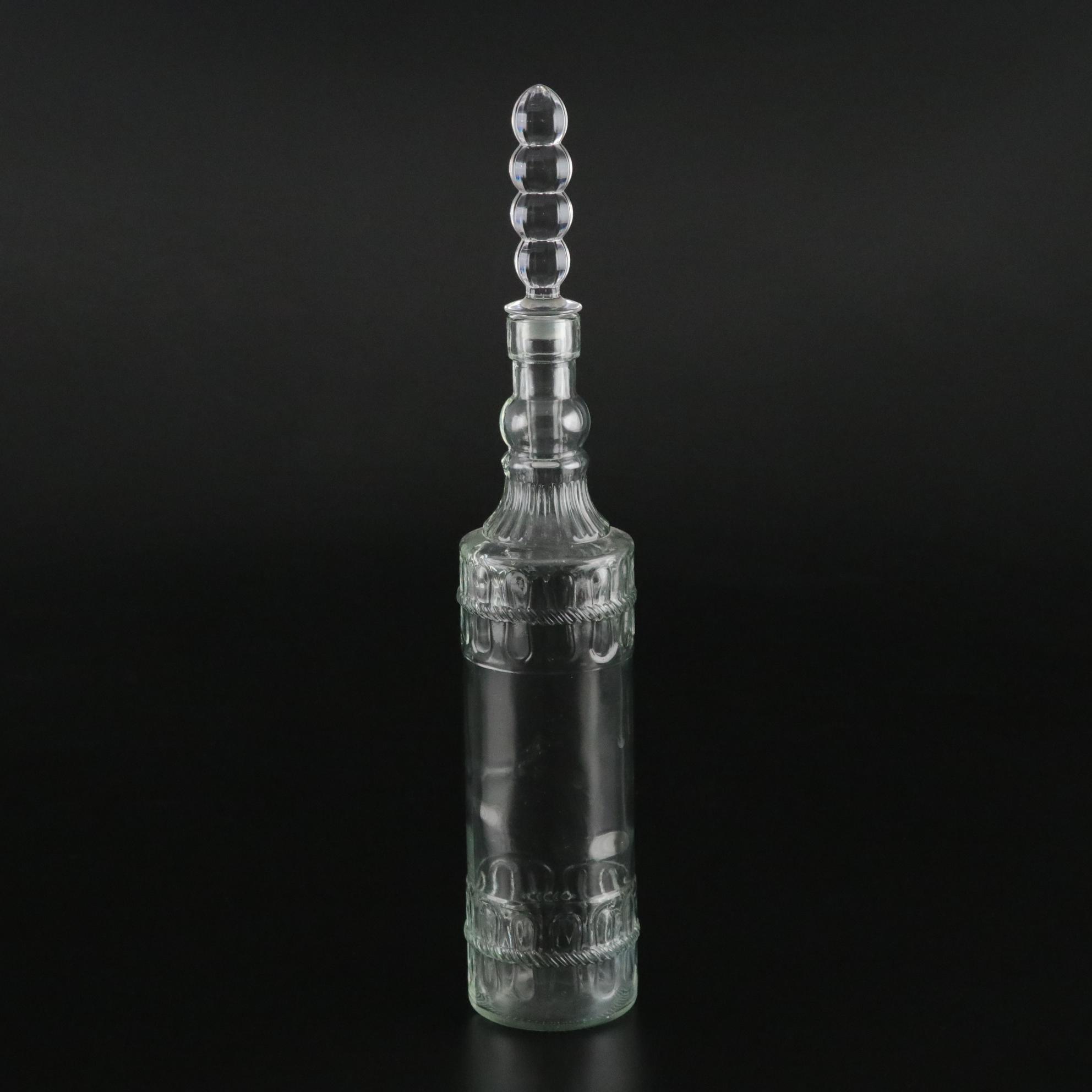 Pair of Molded Glass Bottles with Decorative Crystal Stoppers