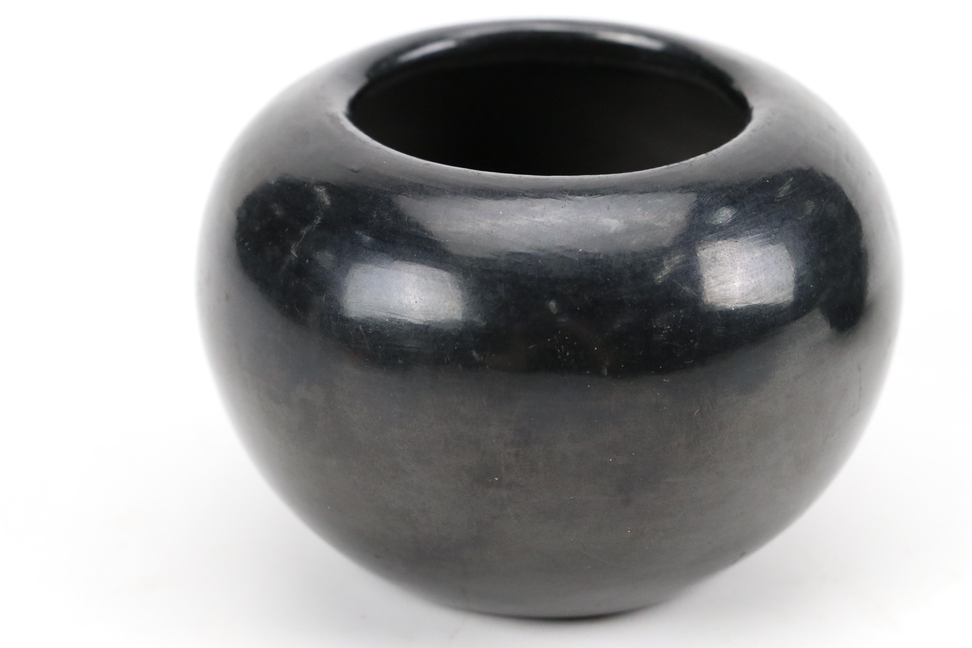 Victor and Naomi Eckleberry and Other Santa Clara Pueblo Blackware Pottery Vases