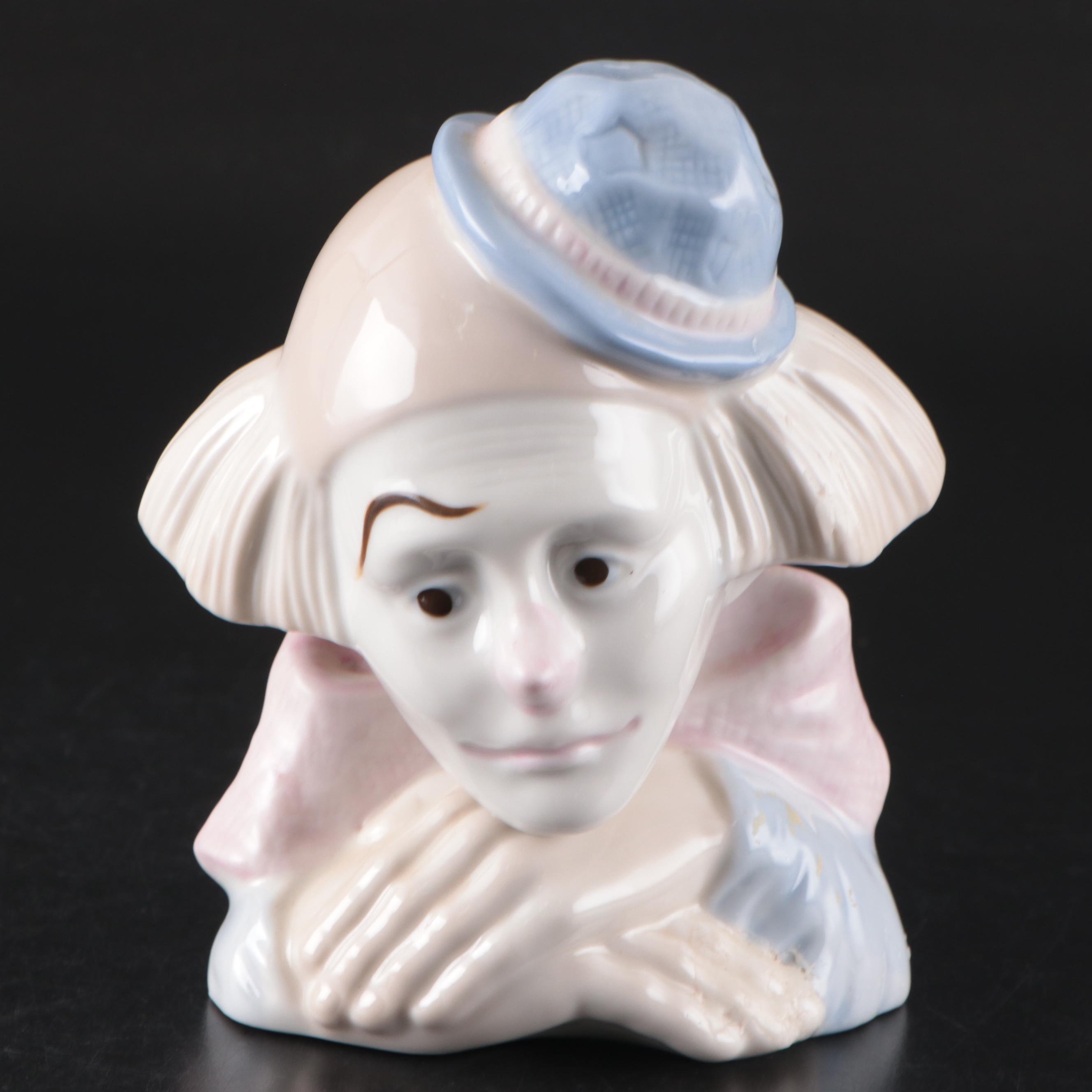 Porcelana de Cuernavaca Sitting Clown Figurine with Other Porcelain Figurines