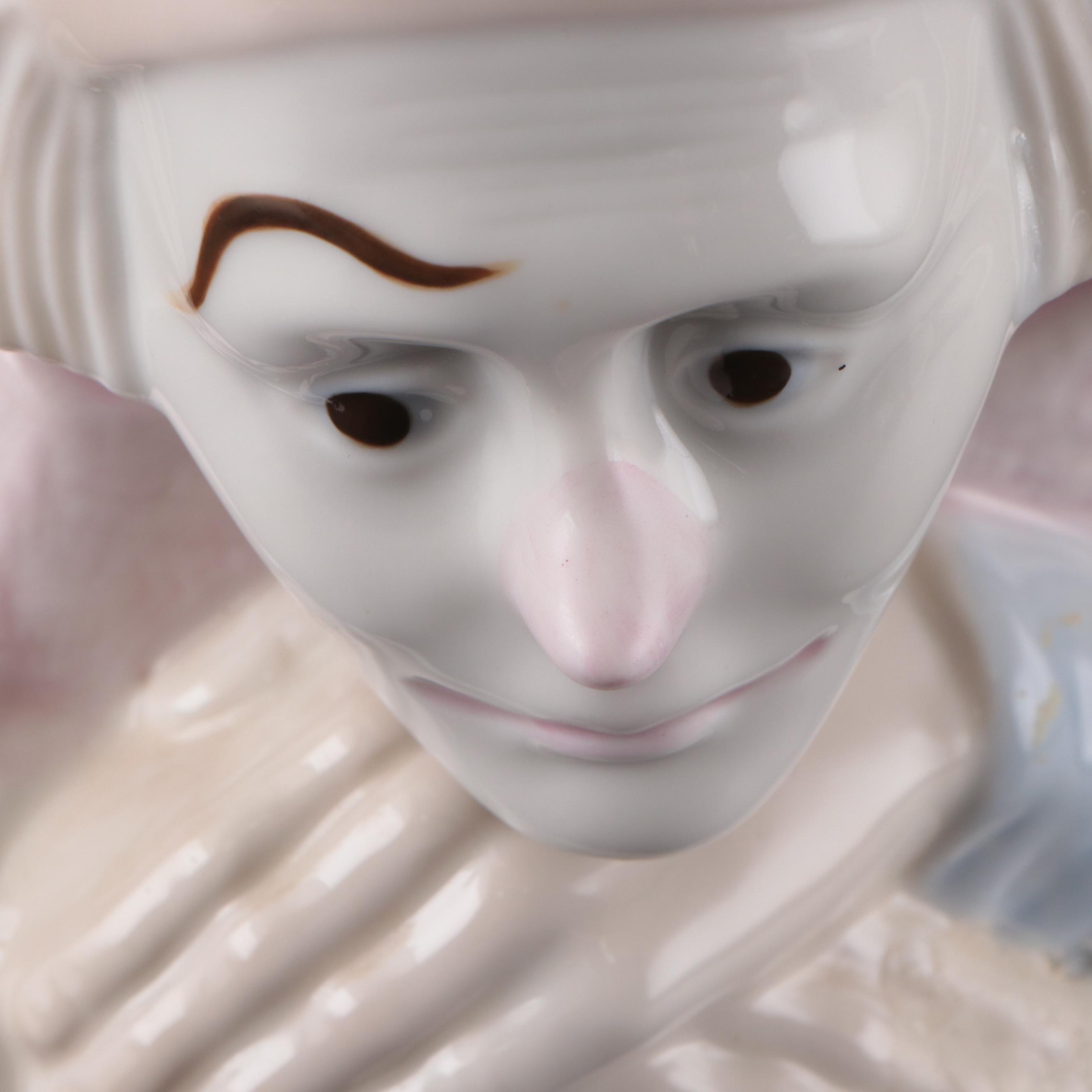 Porcelana de Cuernavaca Sitting Clown Figurine with Other Porcelain Figurines