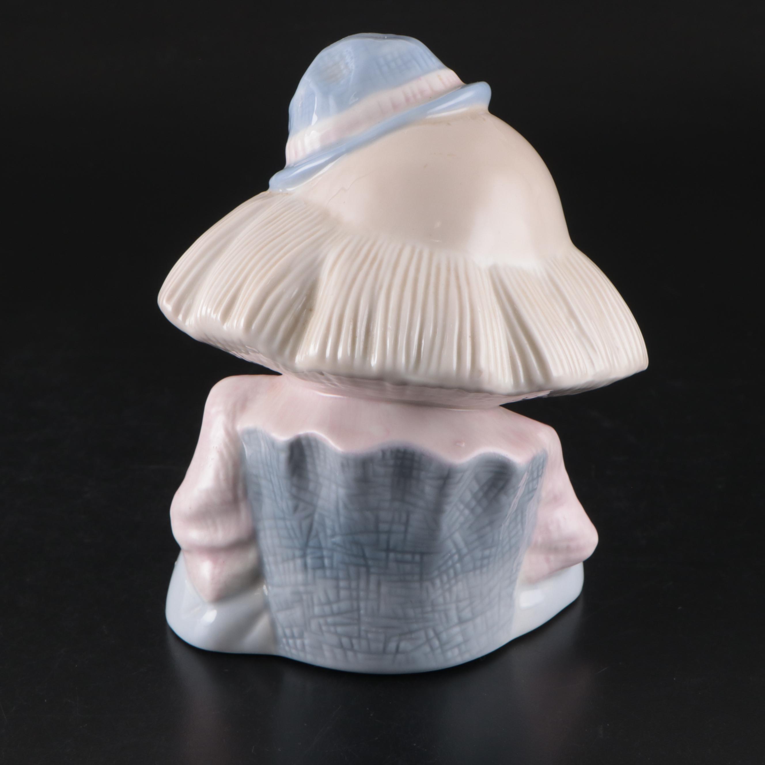 Porcelana de Cuernavaca Sitting Clown Figurine with Other Porcelain Figurines