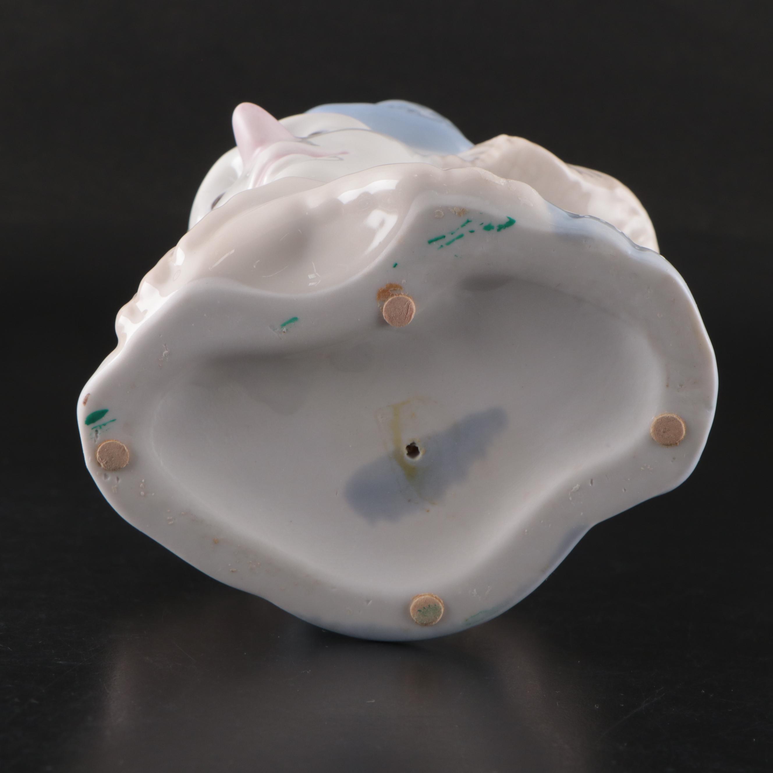 Porcelana de Cuernavaca Sitting Clown Figurine with Other Porcelain Figurines