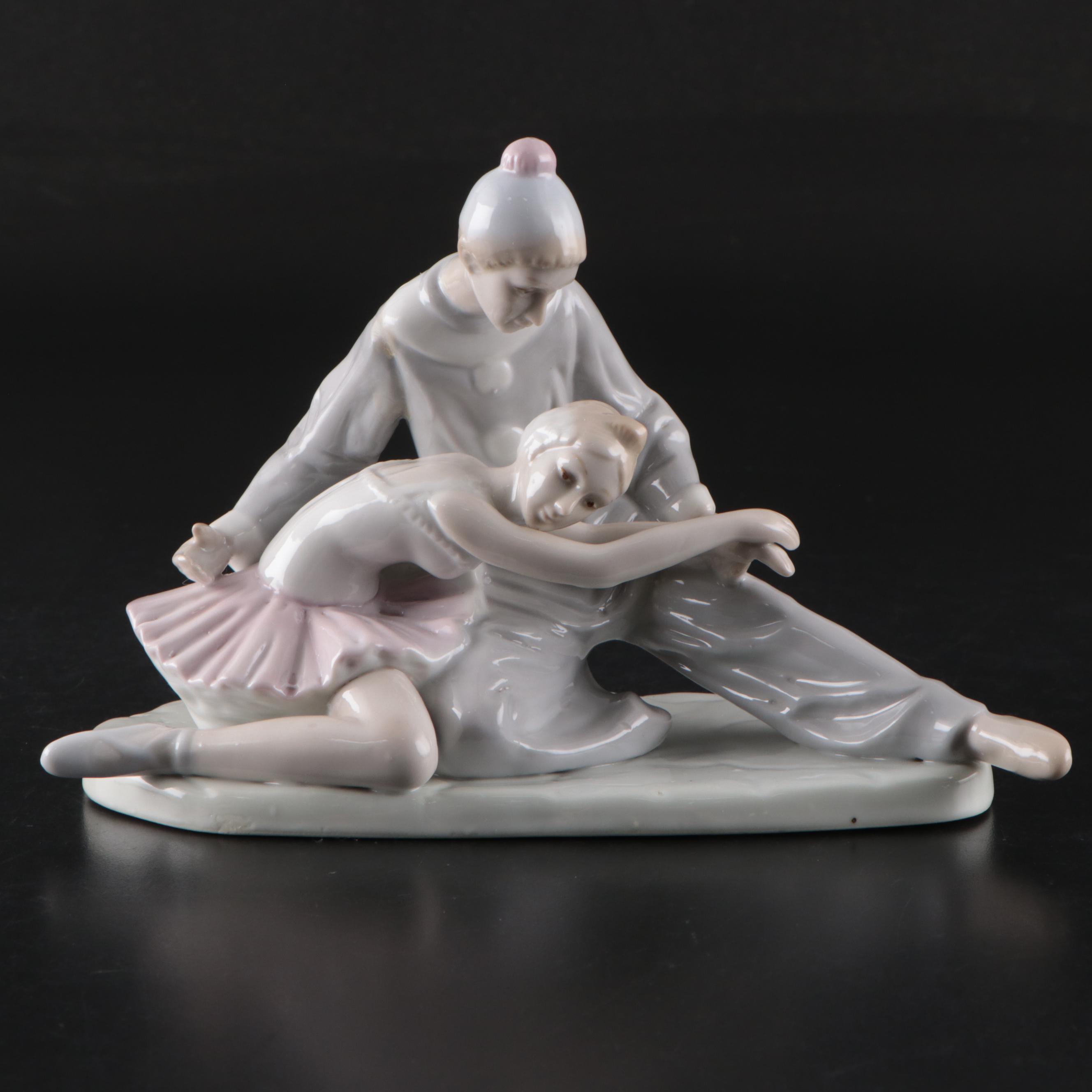 Porcelana de Cuernavaca Sitting Clown Figurine with Other Porcelain Figurines