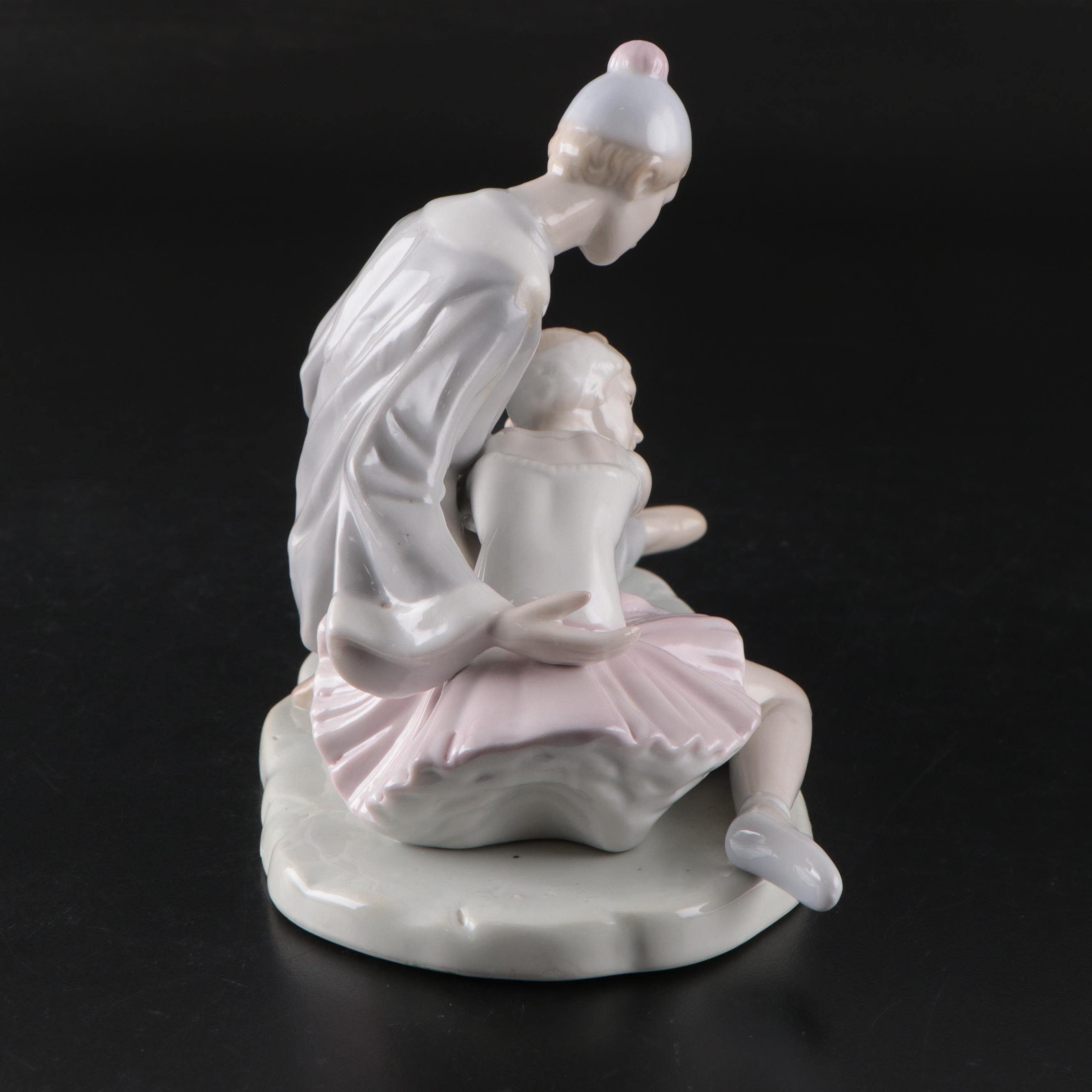 Porcelana de Cuernavaca Sitting Clown Figurine with Other Porcelain Figurines