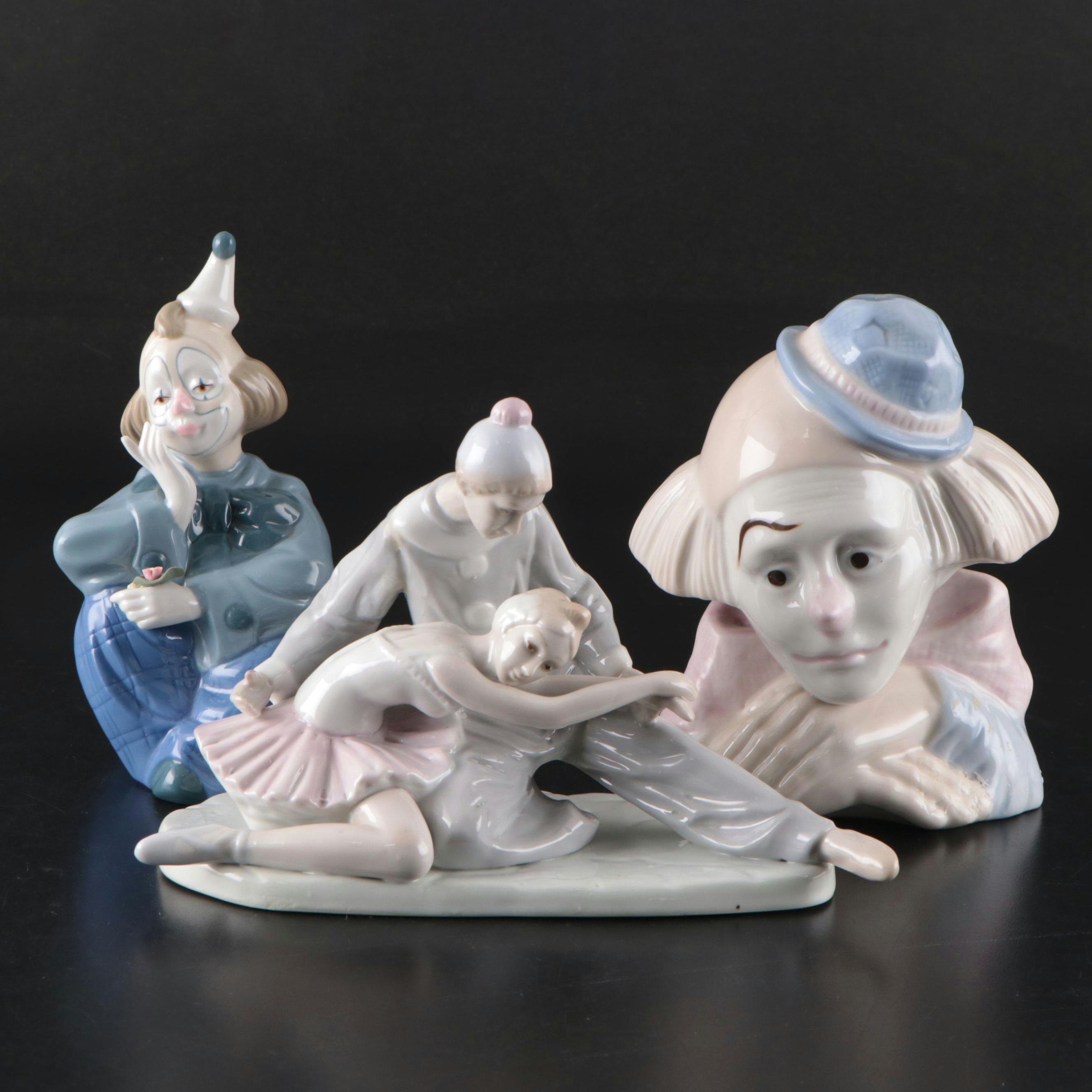 Porcelana de Cuernavaca Sitting Clown Figurine with Other Porcelain Figurines