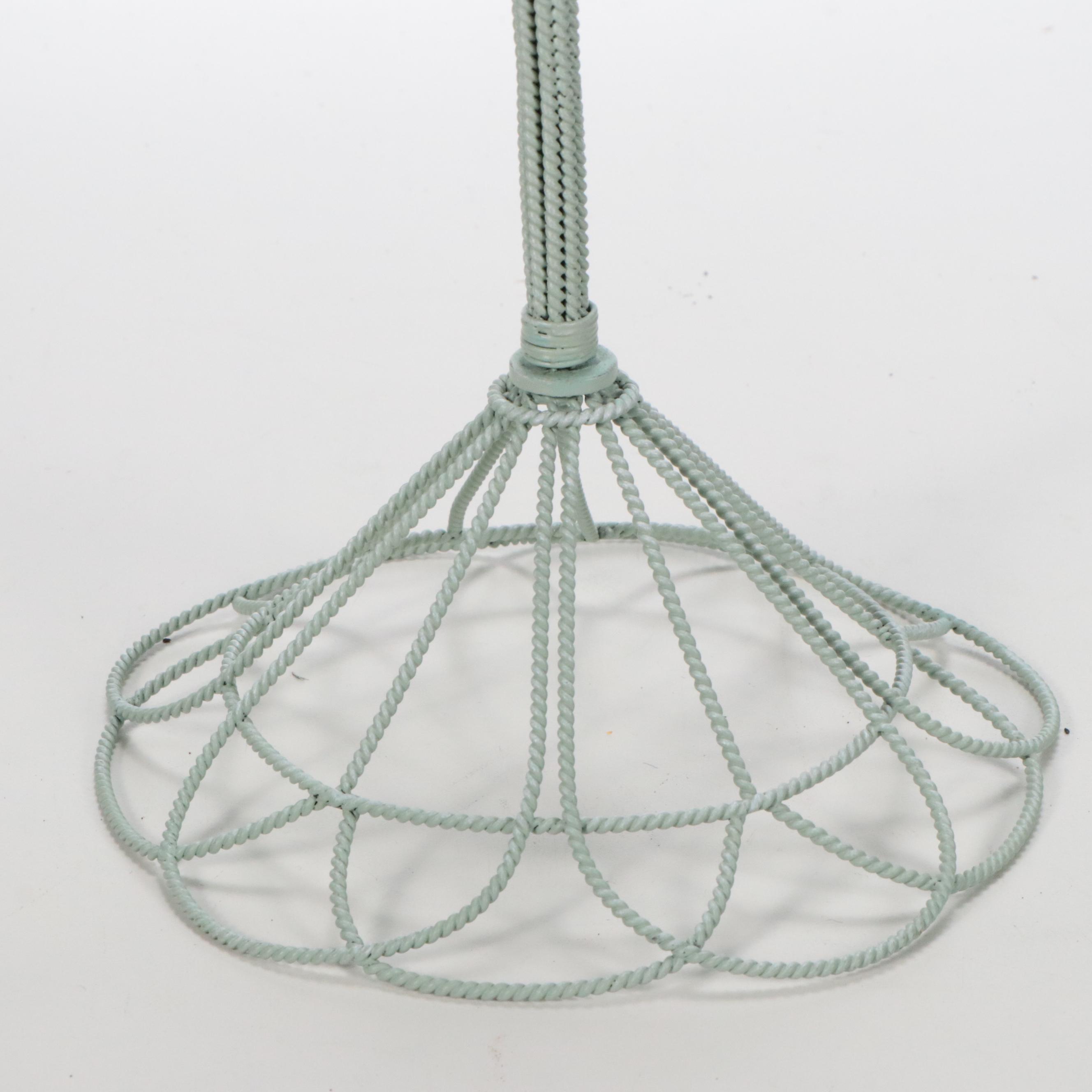 Faux Floral Arrangement in Chanel No. 5 Perfume Bottle Vase with Parrot Figurine