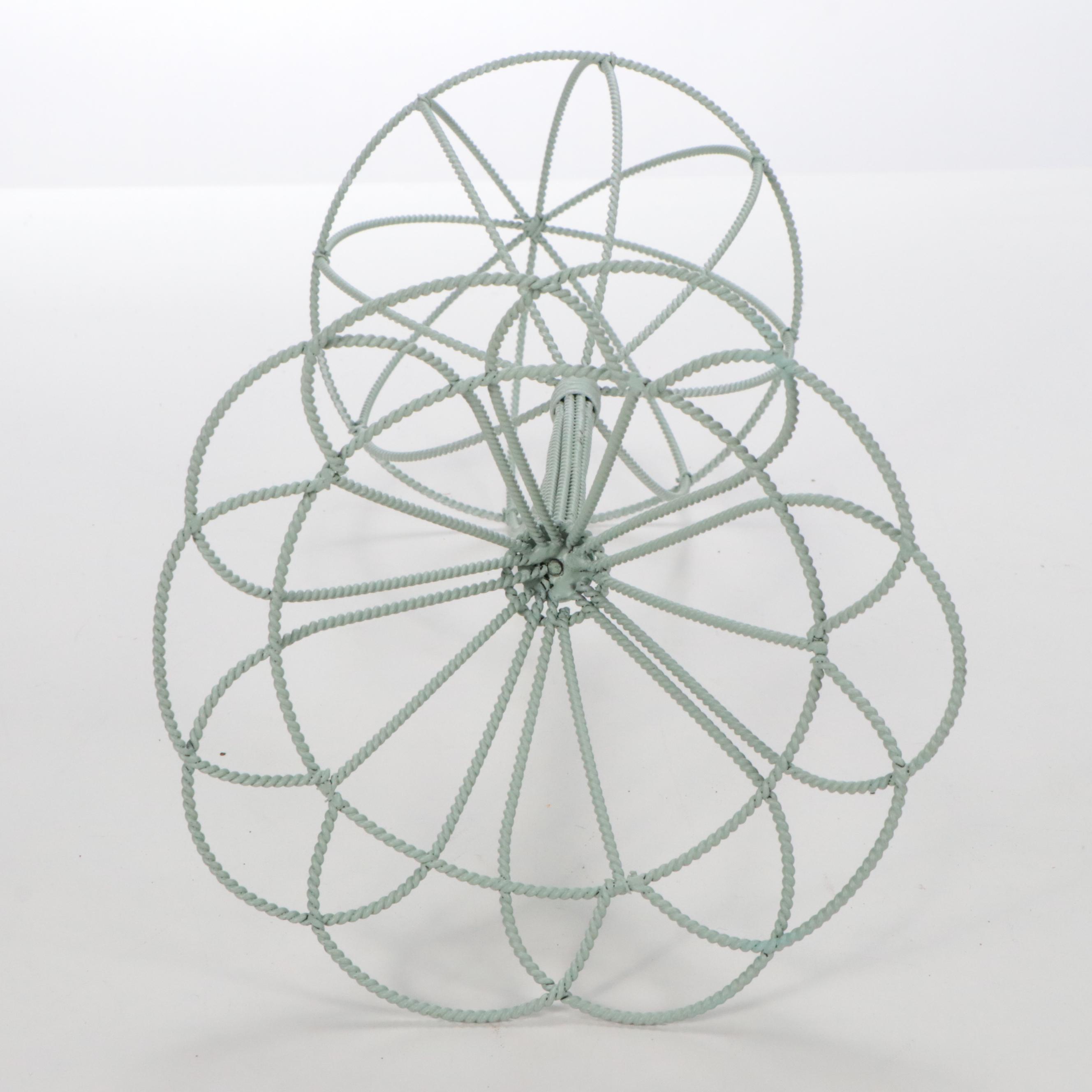 Faux Floral Arrangement in Chanel No. 5 Perfume Bottle Vase with Parrot Figurine