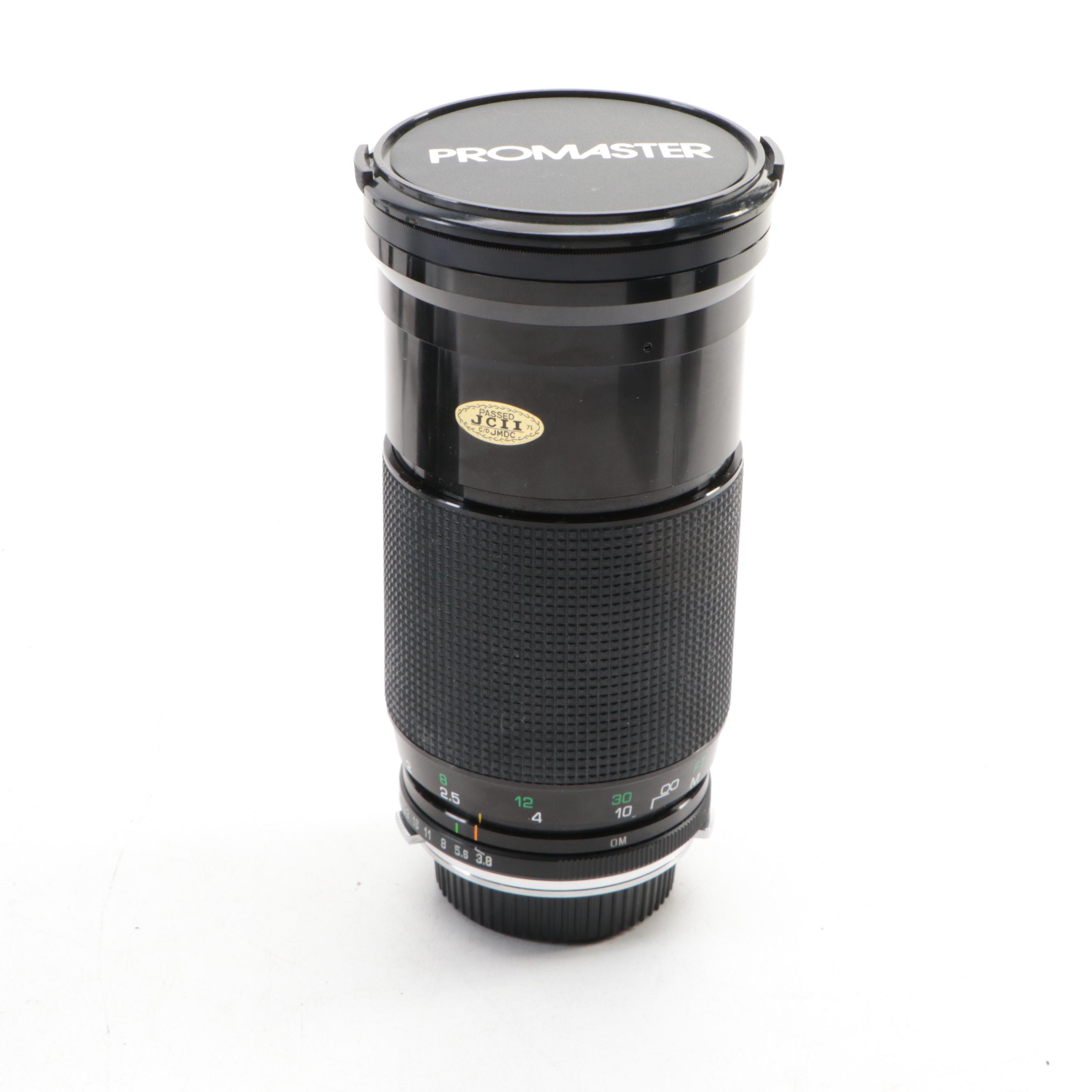 Olympus OM-PC SLR and 35–70mm f/3.4–4.5 Lens with Promaster Macro Lens and More