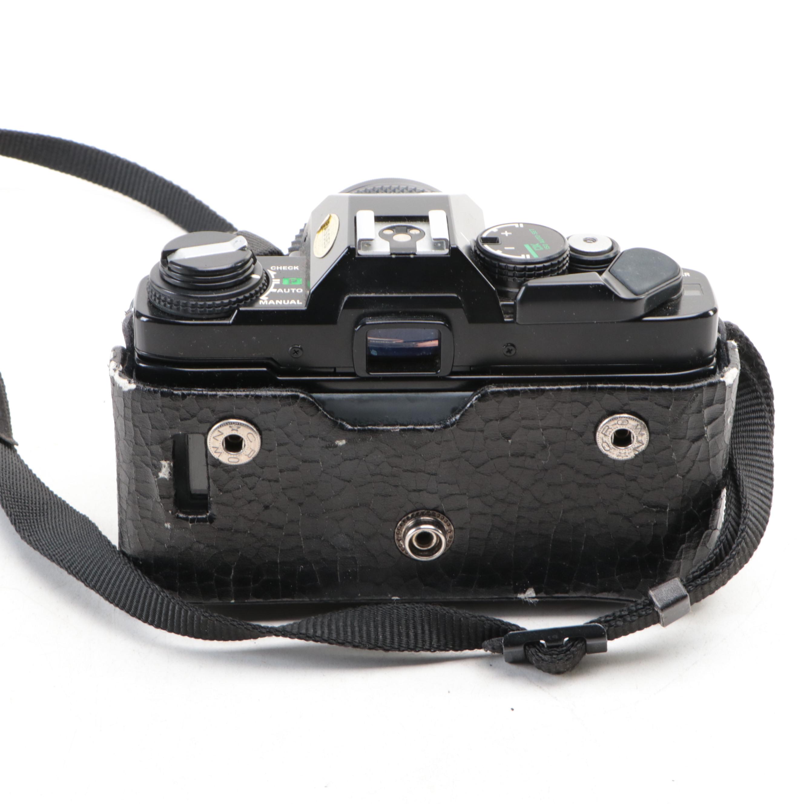 Olympus OM-PC SLR and 35–70mm f/3.4–4.5 Lens with Promaster Macro Lens and More