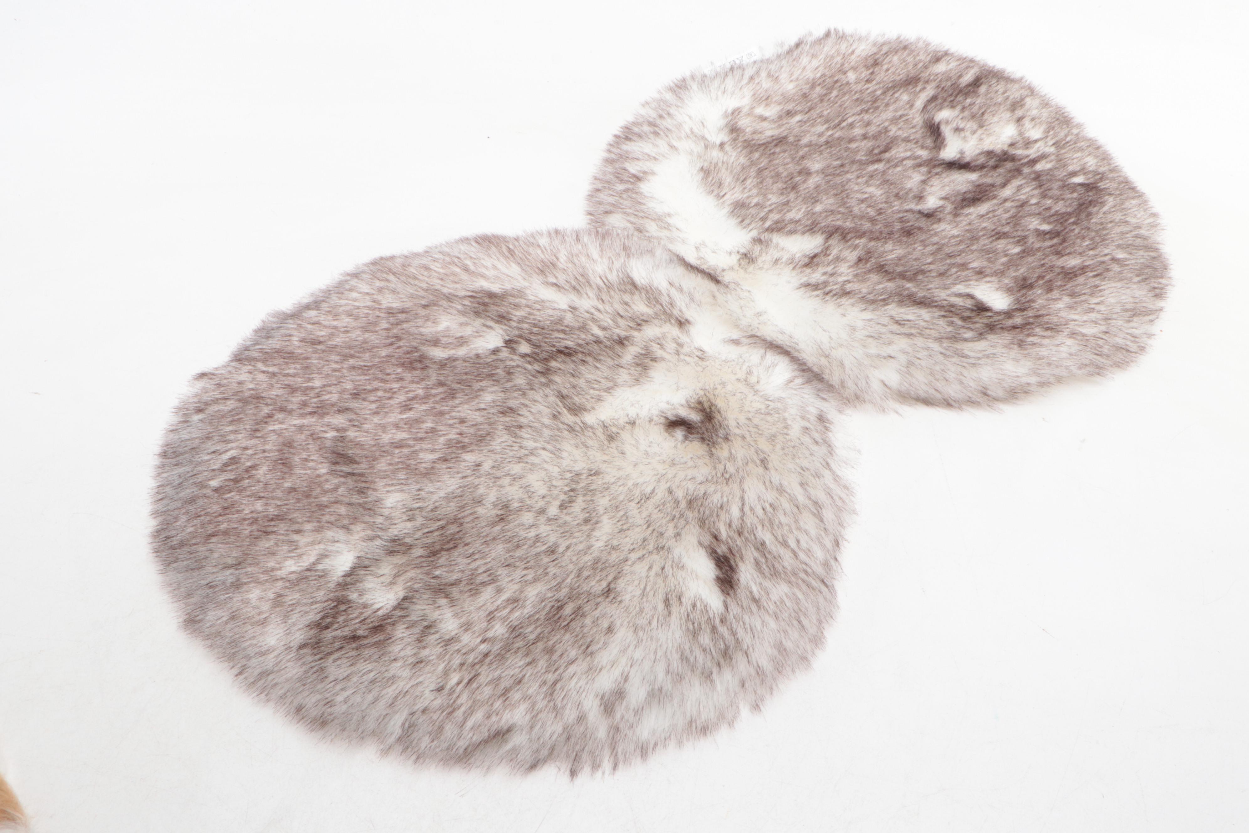 Four Machine Made Faux Fur Floor Mats