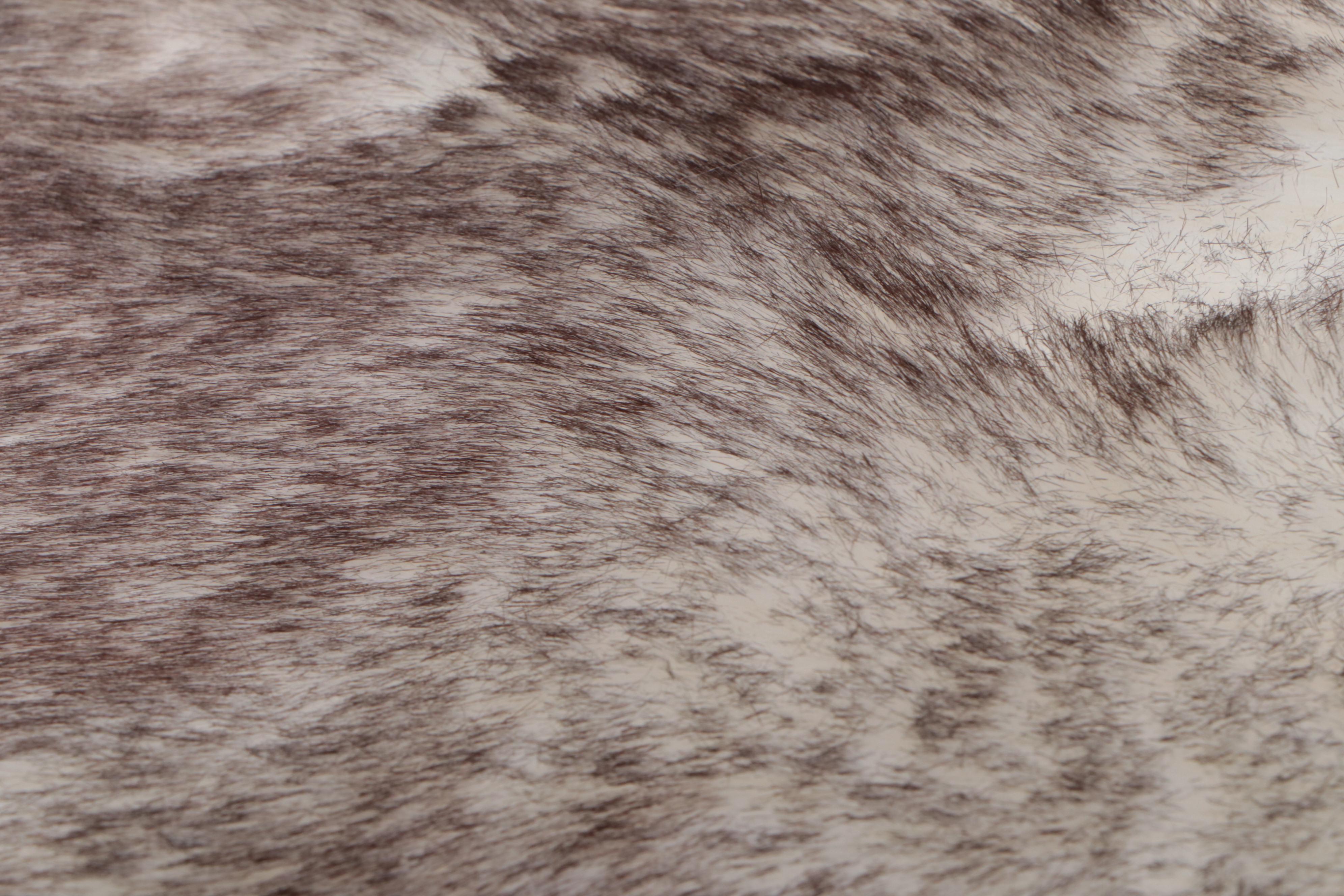 Four Machine Made Faux Fur Floor Mats