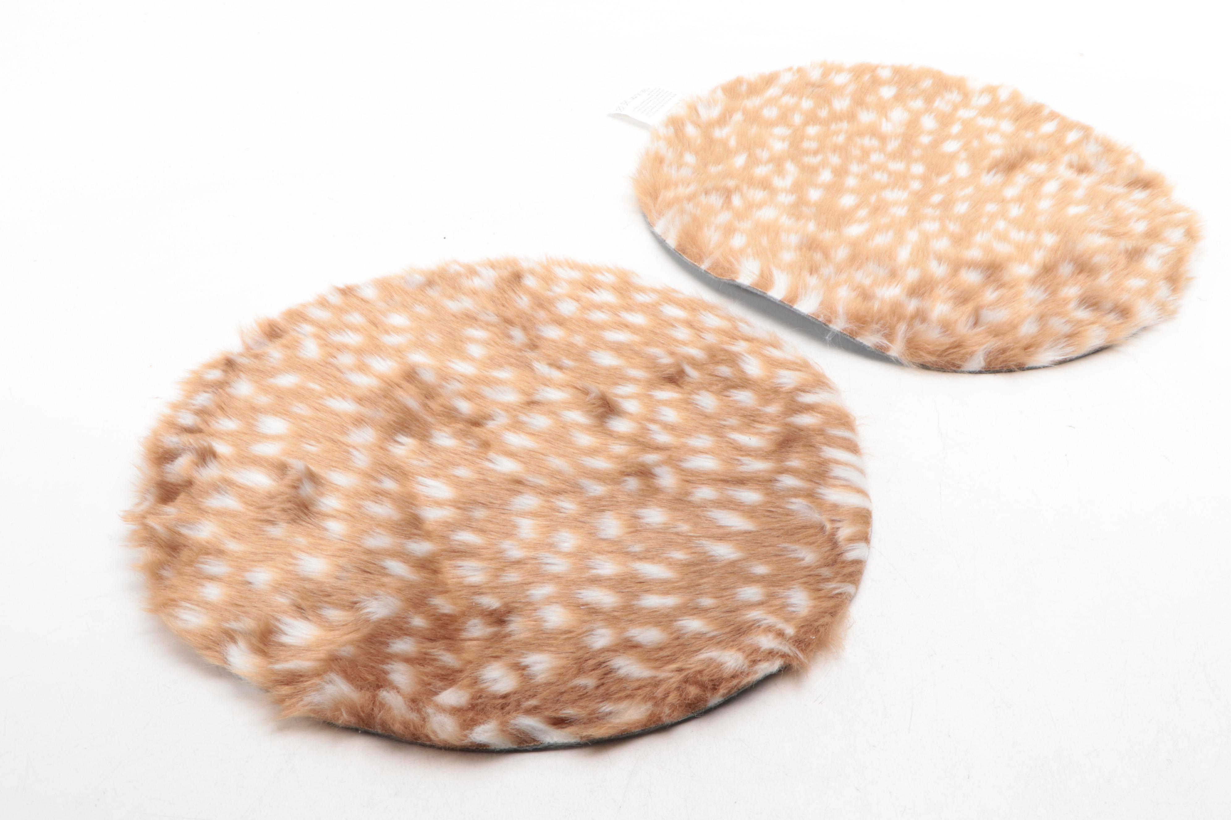 Four Machine Made Faux Fur Floor Mats