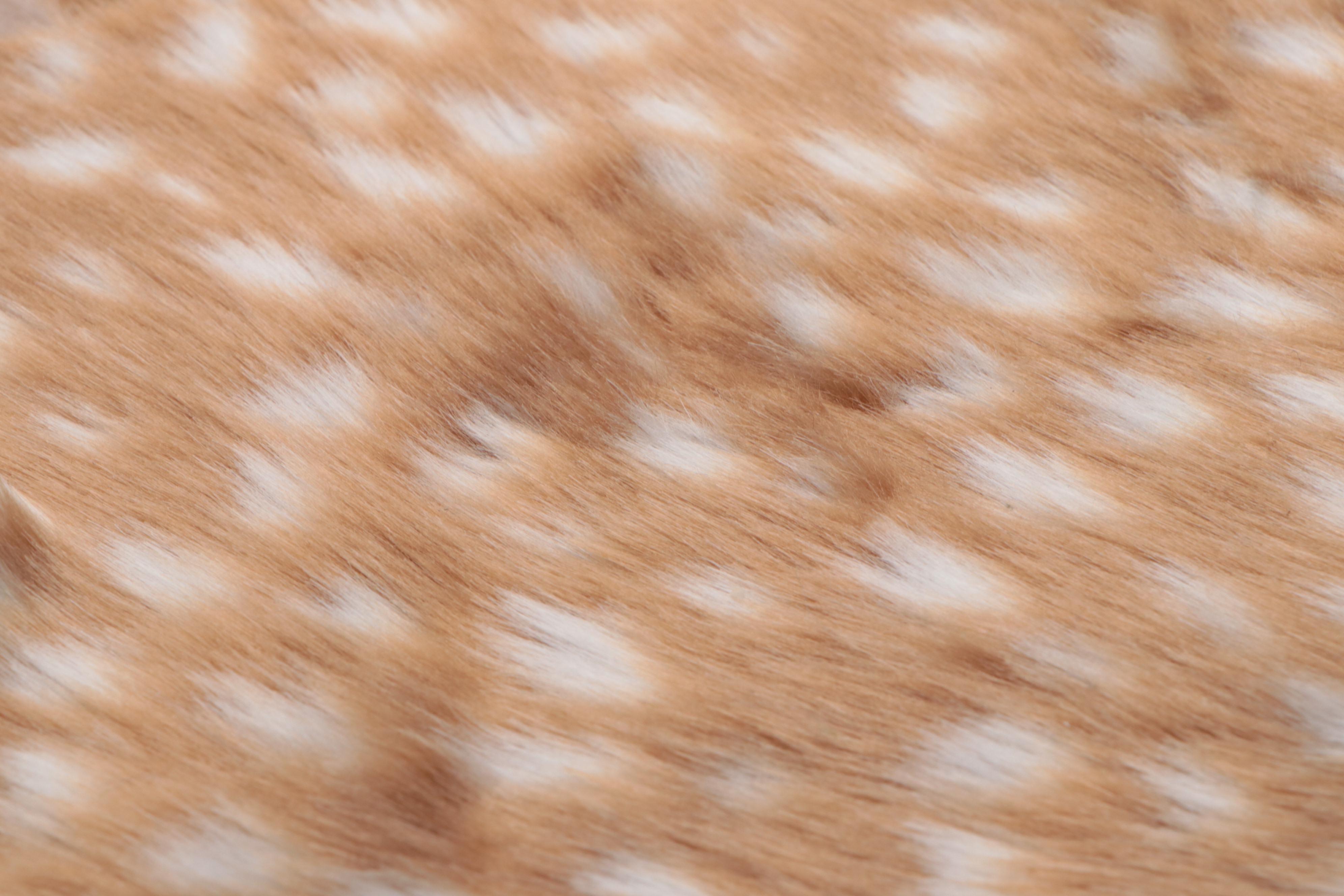 Four Machine Made Faux Fur Floor Mats