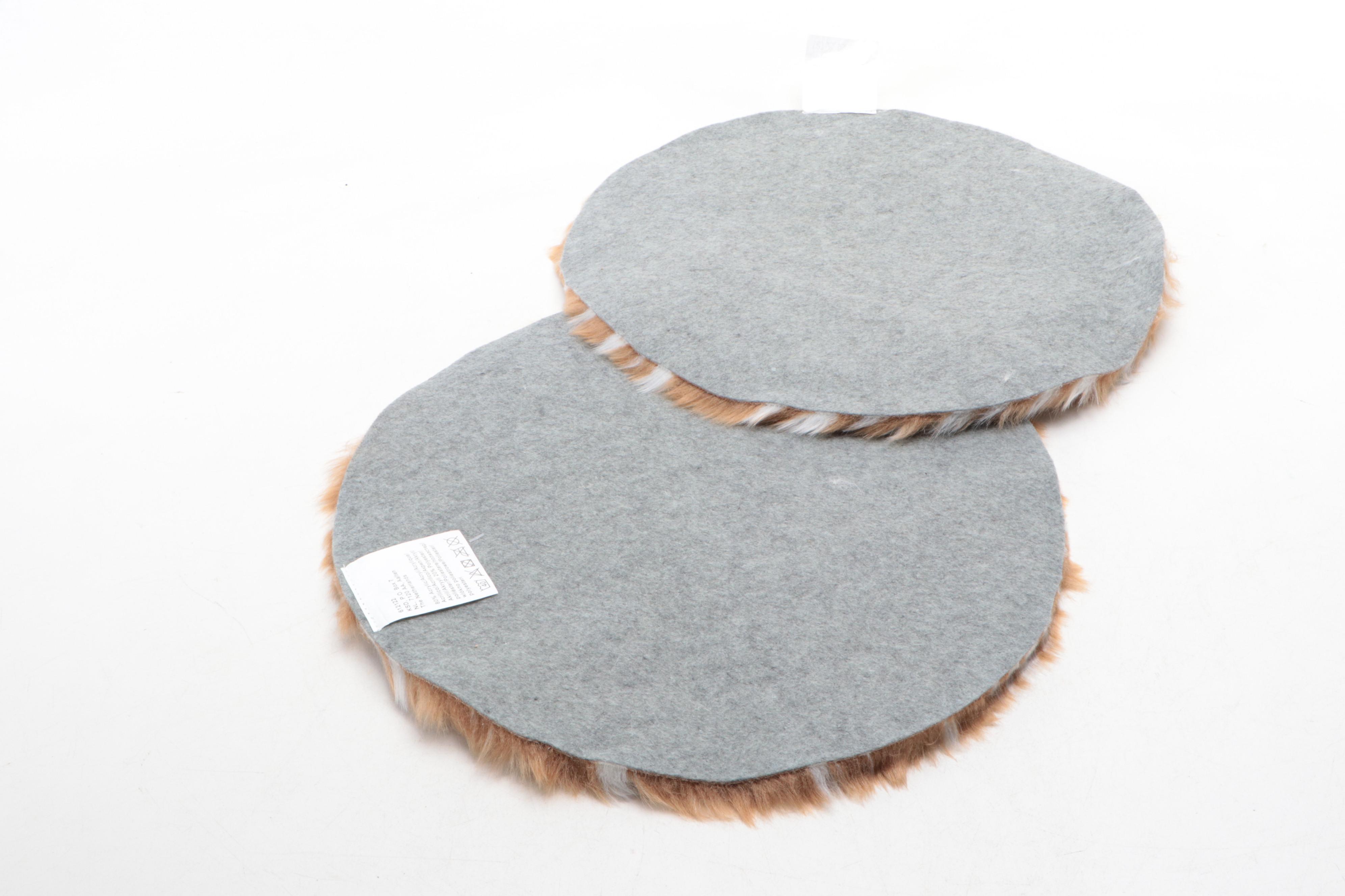 Four Machine Made Faux Fur Floor Mats