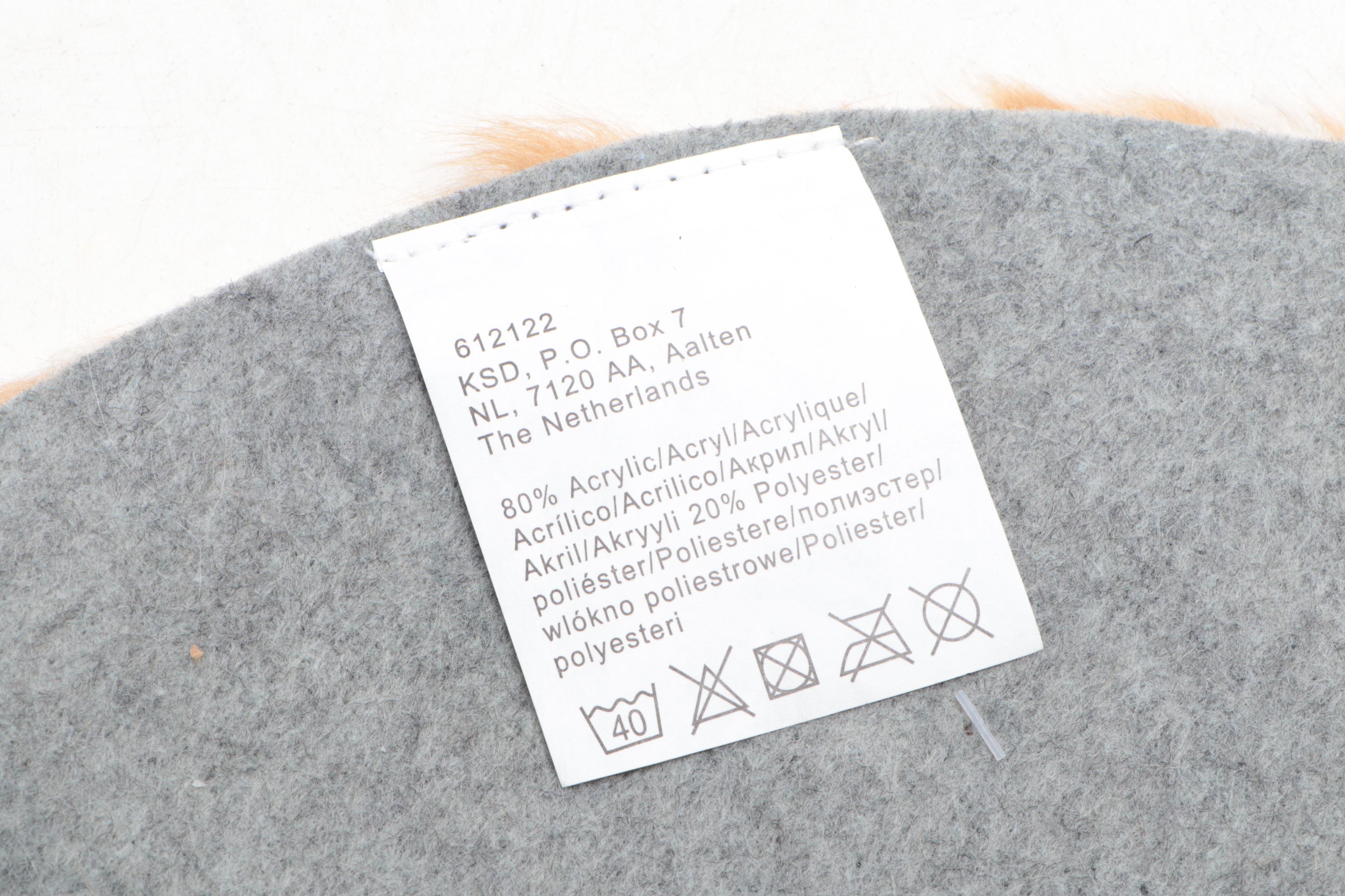 Four Machine Made Faux Fur Floor Mats