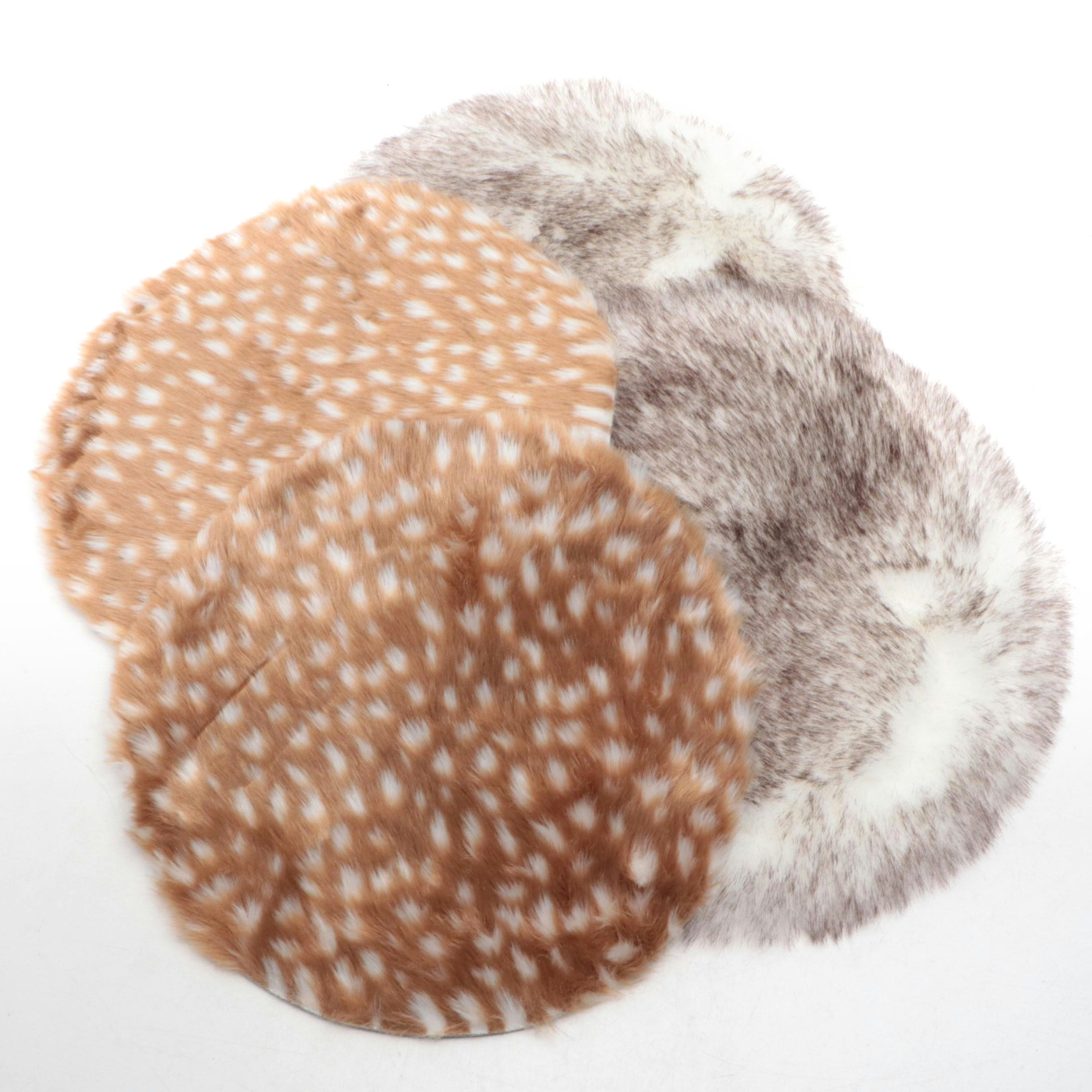 Four Machine Made Faux Fur Floor Mats