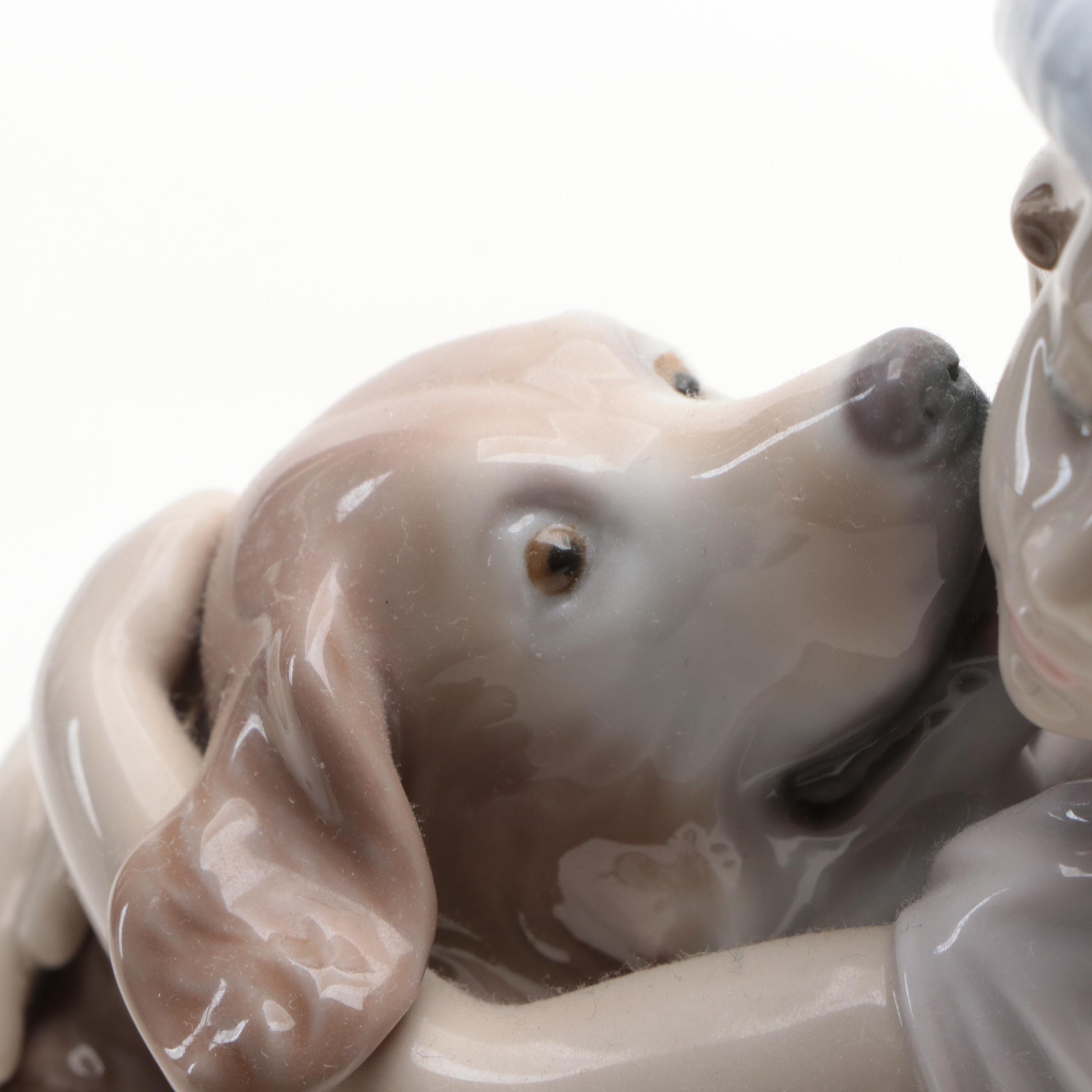 Lladró "My Loyal Friend" and "A Warm Welcome" Porcelain Figurines