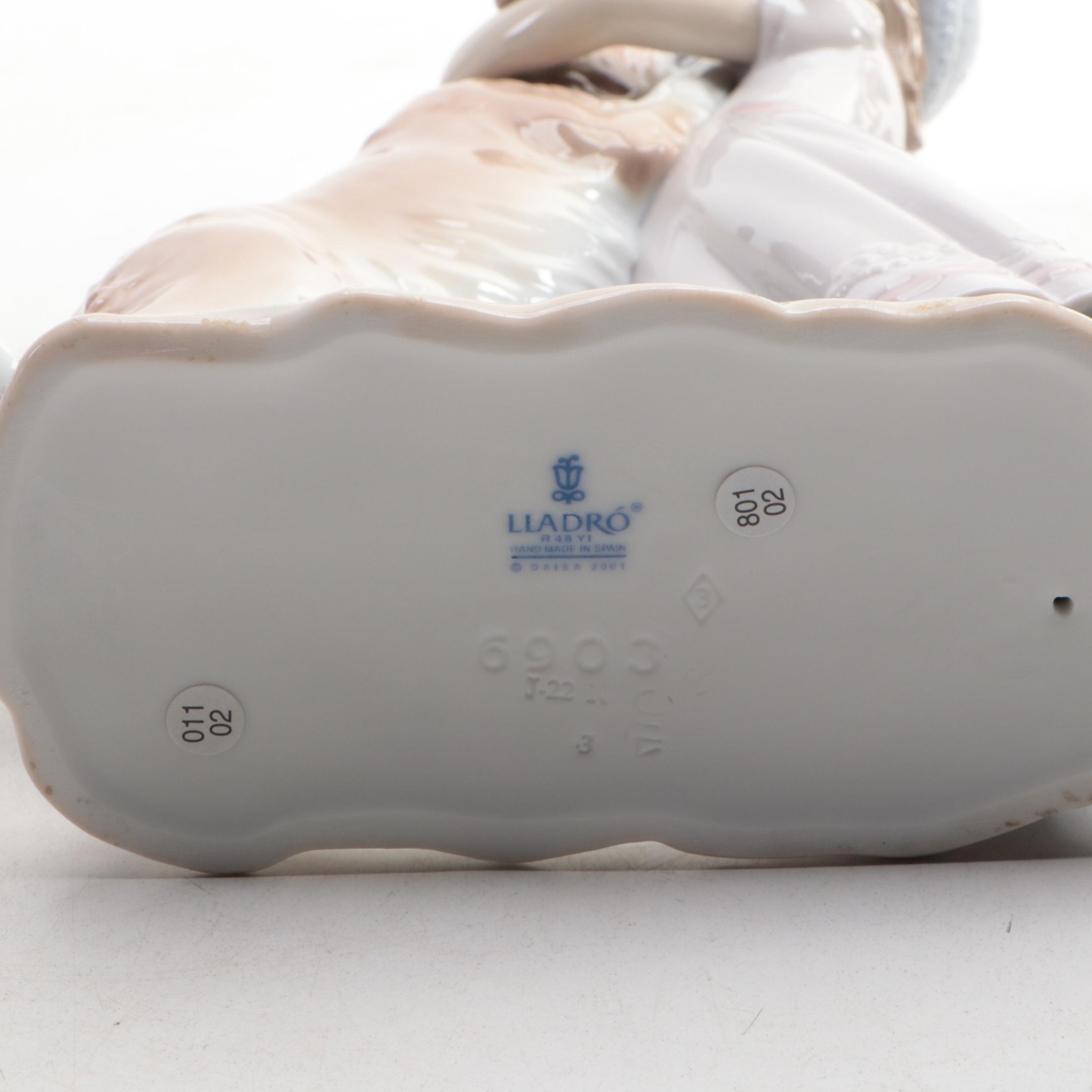 Lladró "My Loyal Friend" and "A Warm Welcome" Porcelain Figurines