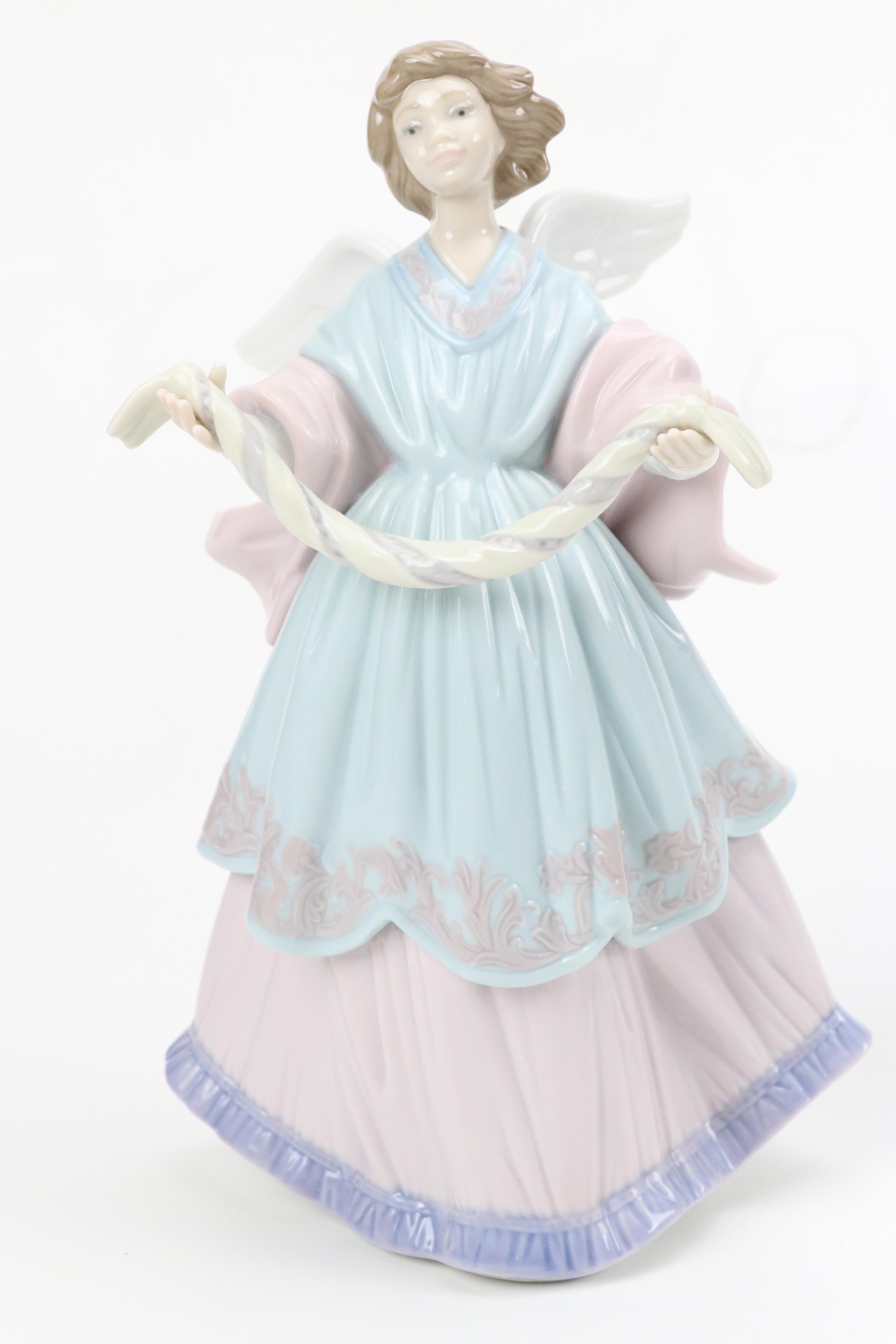 Lladró "Angel of the Stars," "Joyful Offering" and "Rejoice" Porcelain Figurines