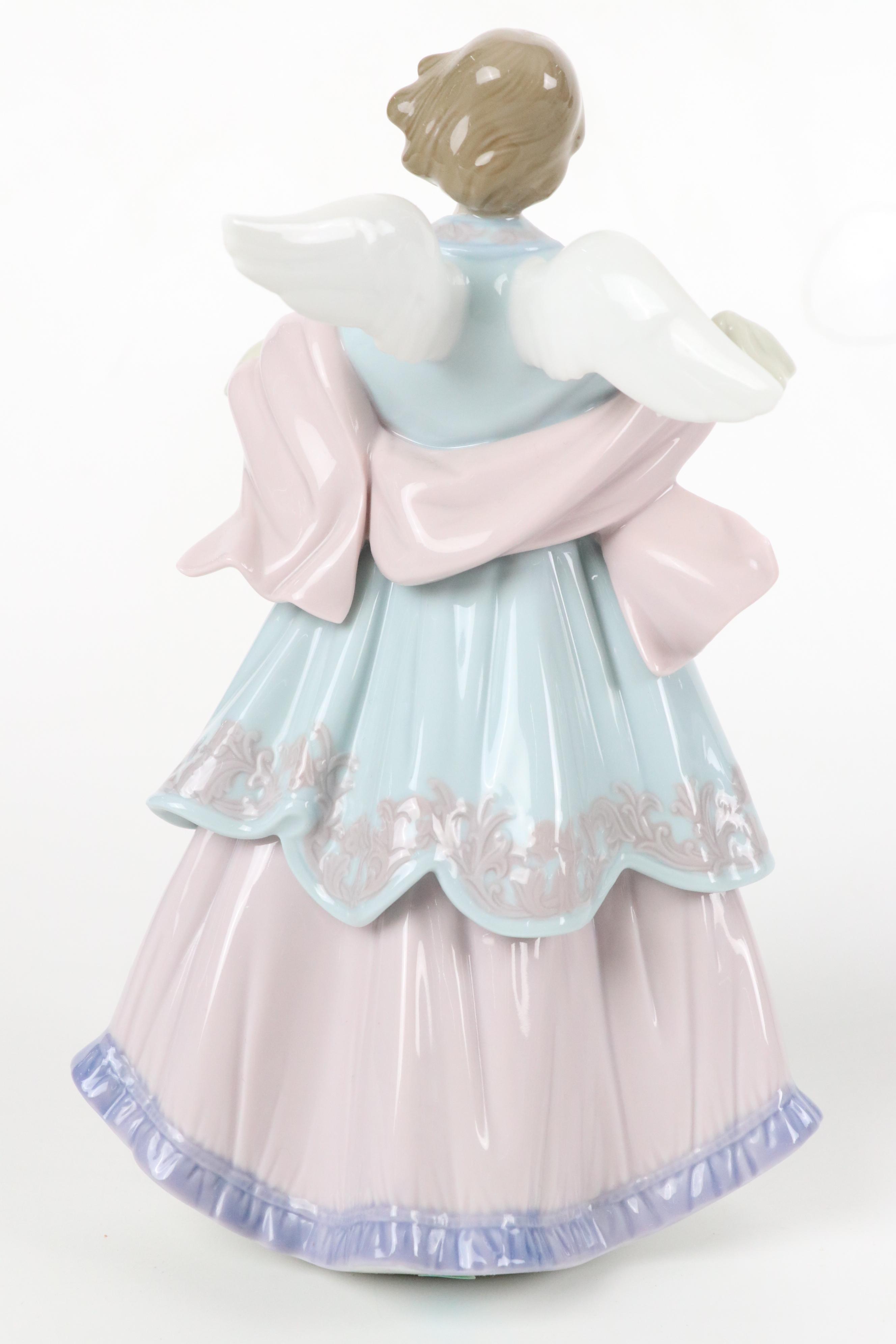 Lladró "Angel of the Stars," "Joyful Offering" and "Rejoice" Porcelain Figurines