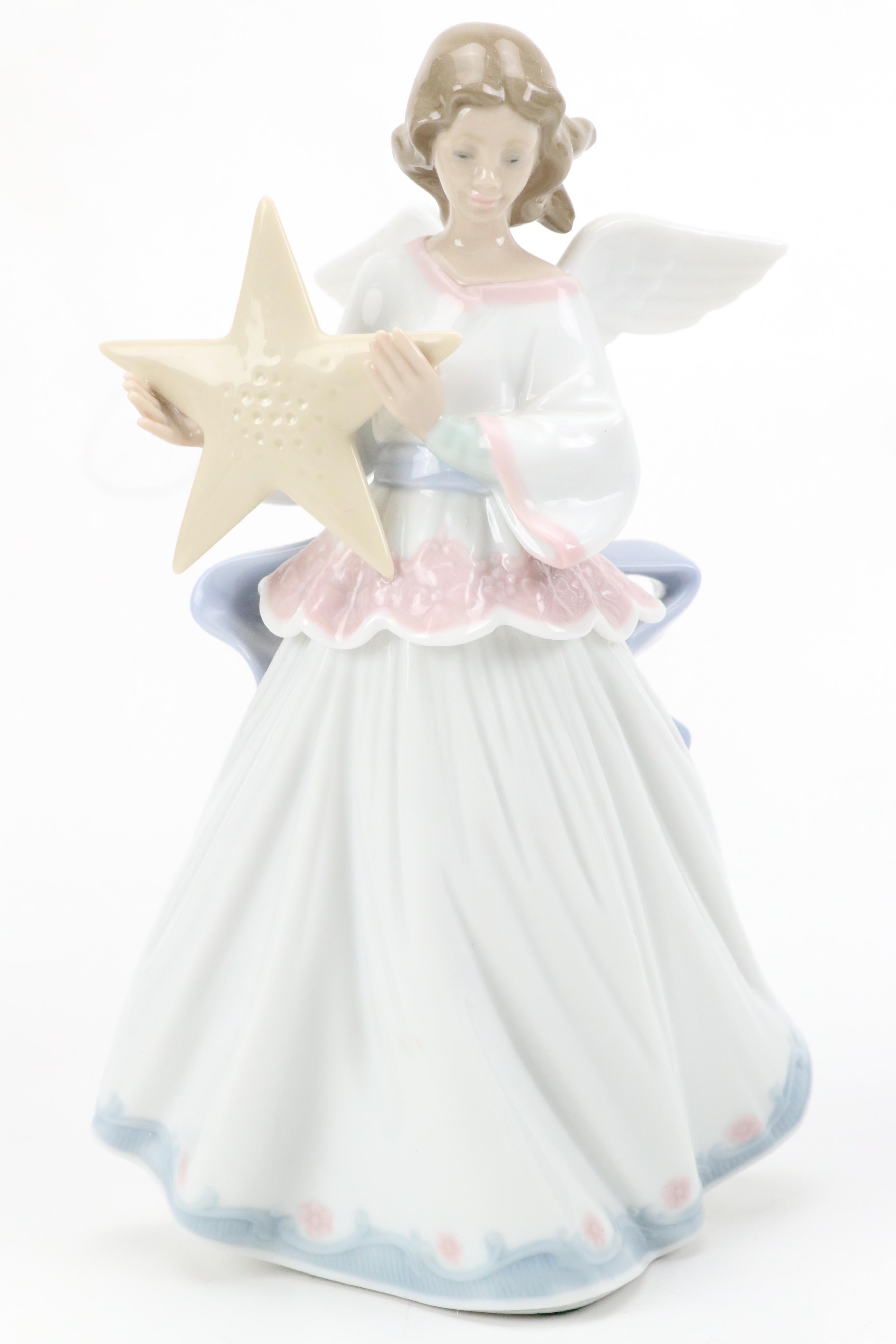 Lladró "Angel of the Stars," "Joyful Offering" and "Rejoice" Porcelain Figurines