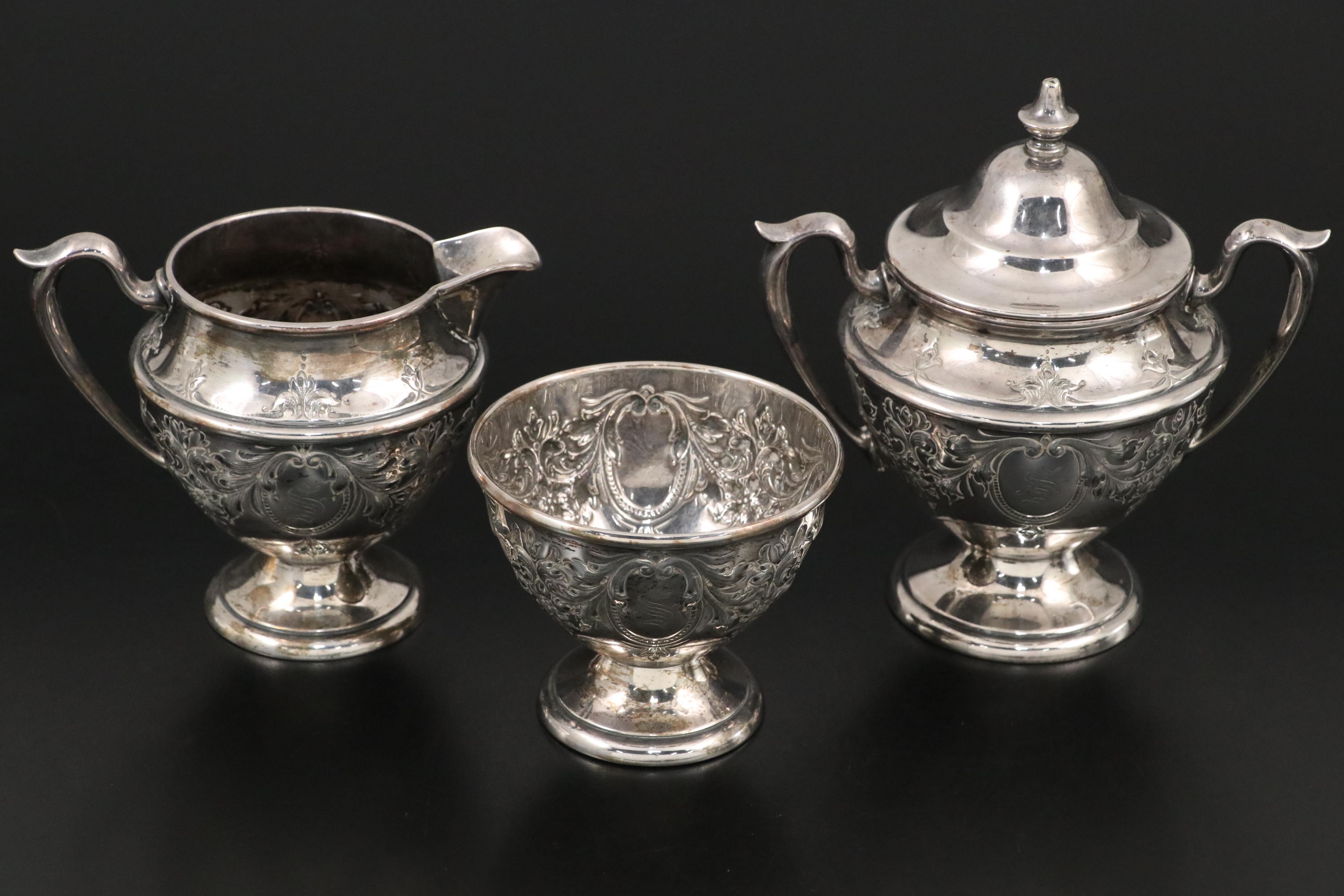 Dunkirk Silversmiths Hand-Chased Sterling Coffee and Tea Service