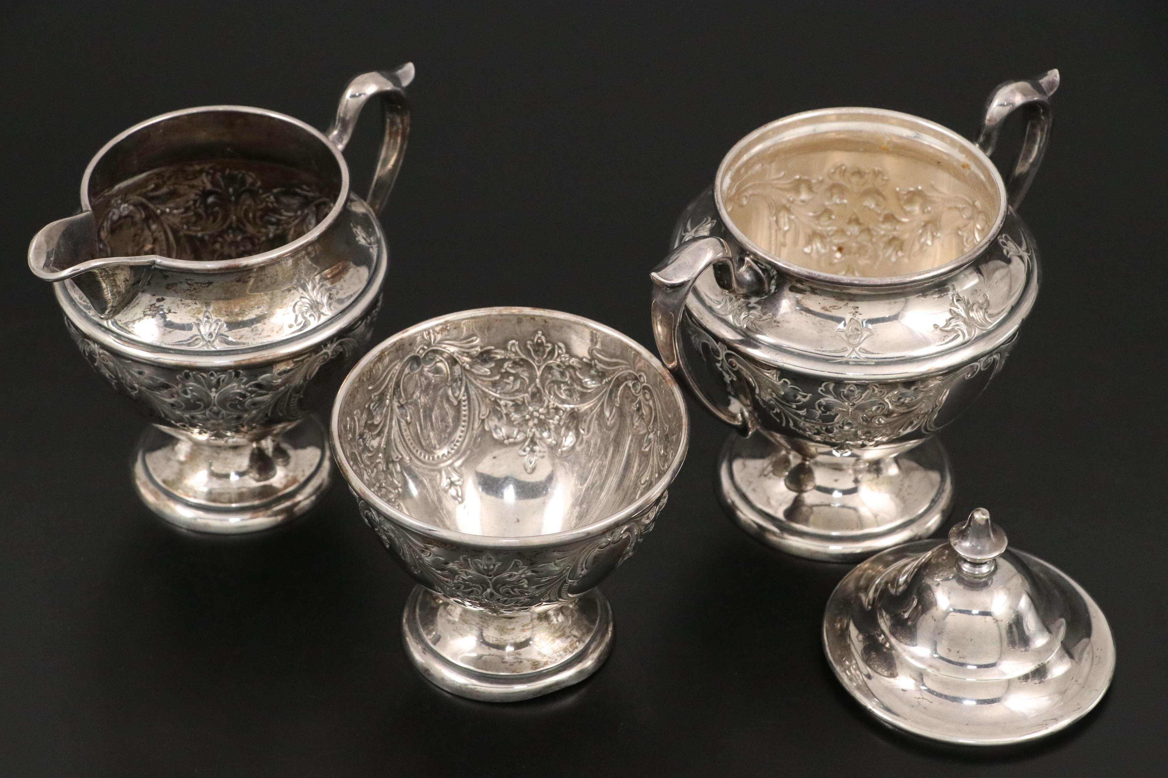 Dunkirk Silversmiths Hand-Chased Sterling Coffee and Tea Service