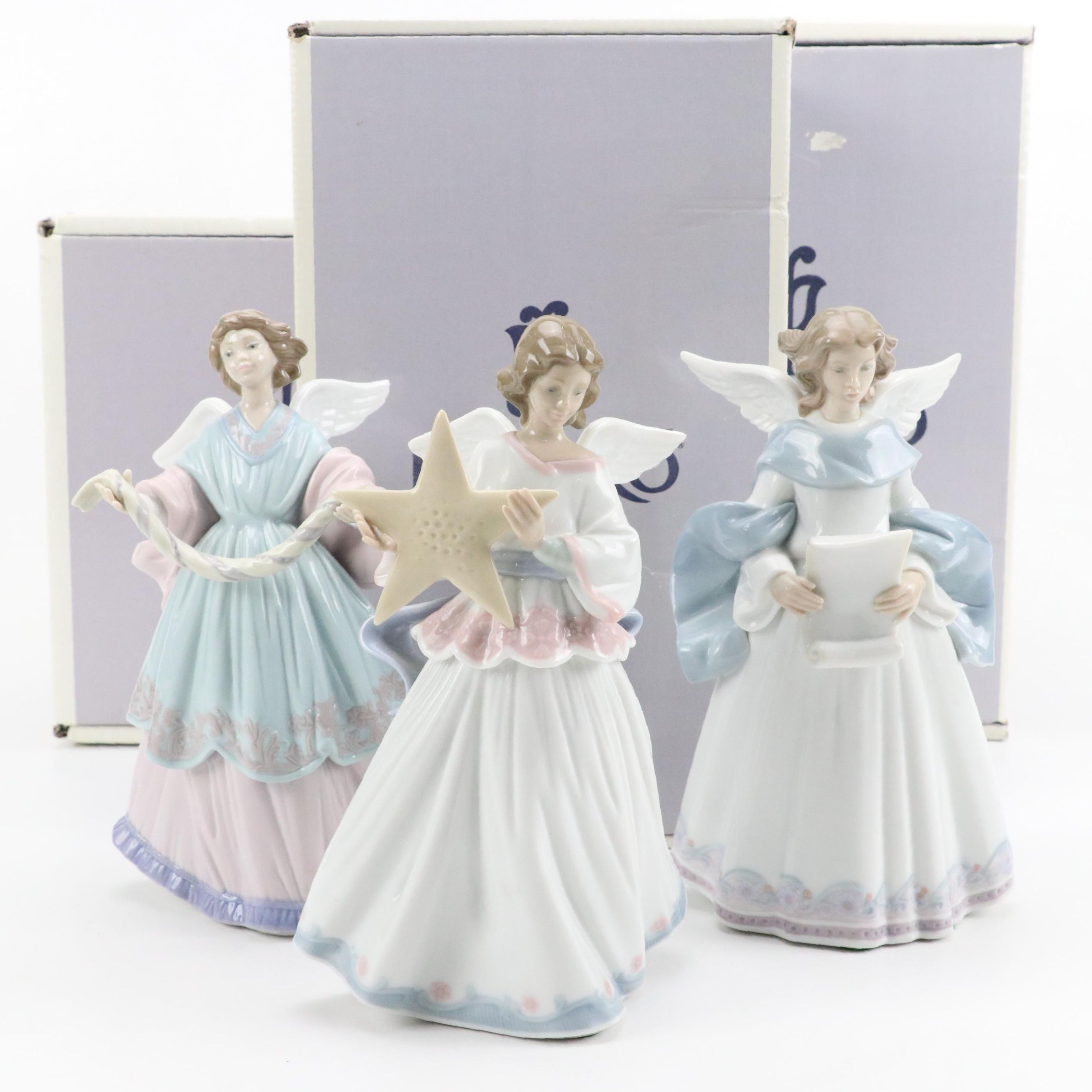 Lladró "Angel of the Stars," "Joyful Offering" and "Rejoice" Porcelain Figurines