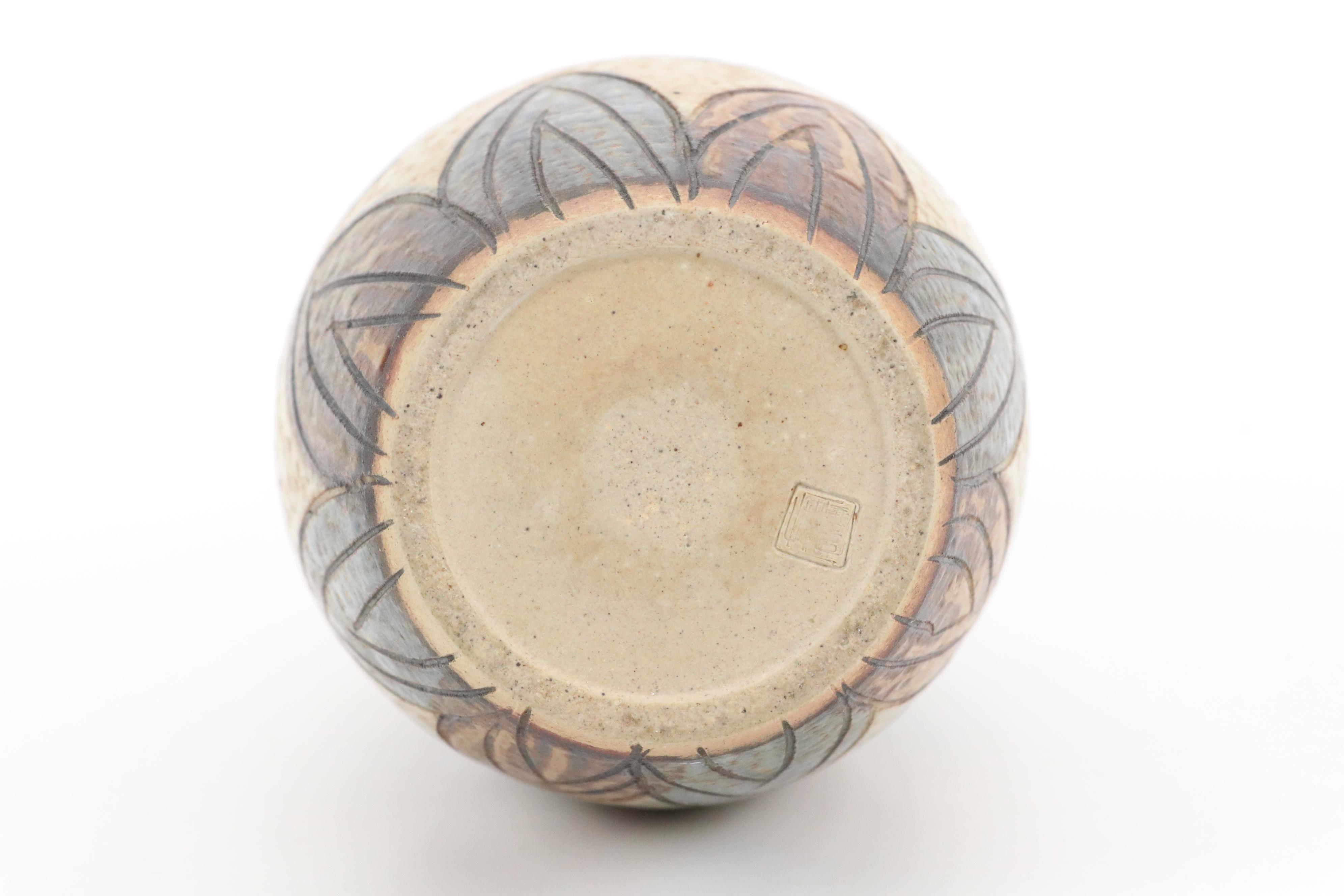 Japanese Hand-Etched Stoneware Vase and Embossed Ceramic Vase with Monkey Motifs