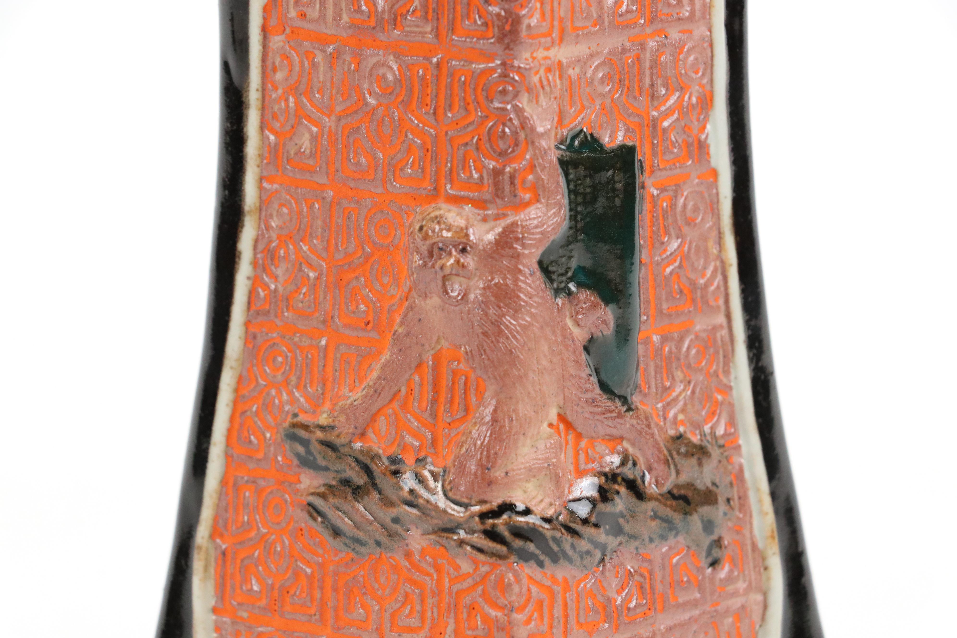 Japanese Hand-Etched Stoneware Vase and Embossed Ceramic Vase with Monkey Motifs