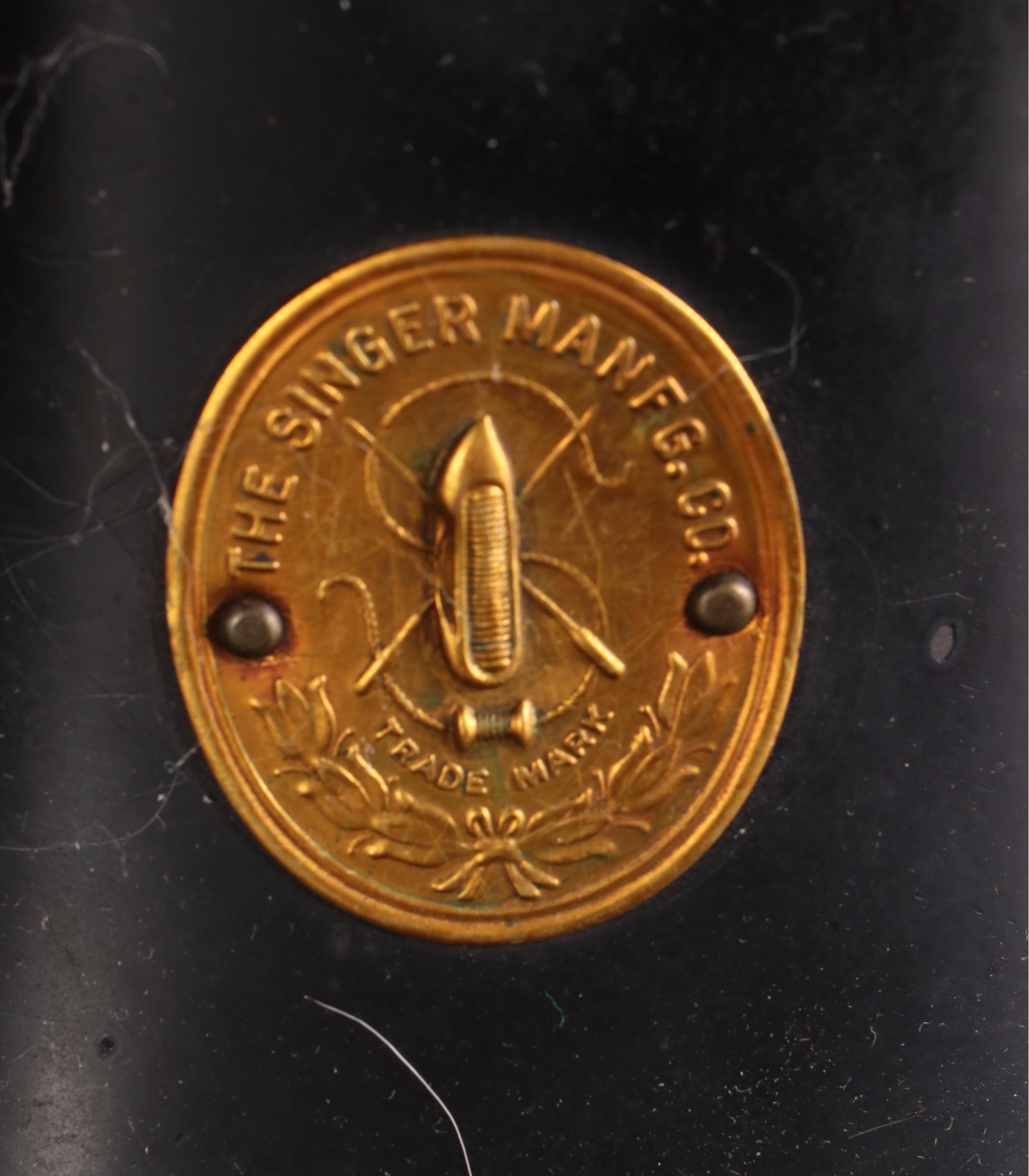 The Singer Manufacturing Co. Sewing Machine in Walnut Cabinet, Mid-20th Century