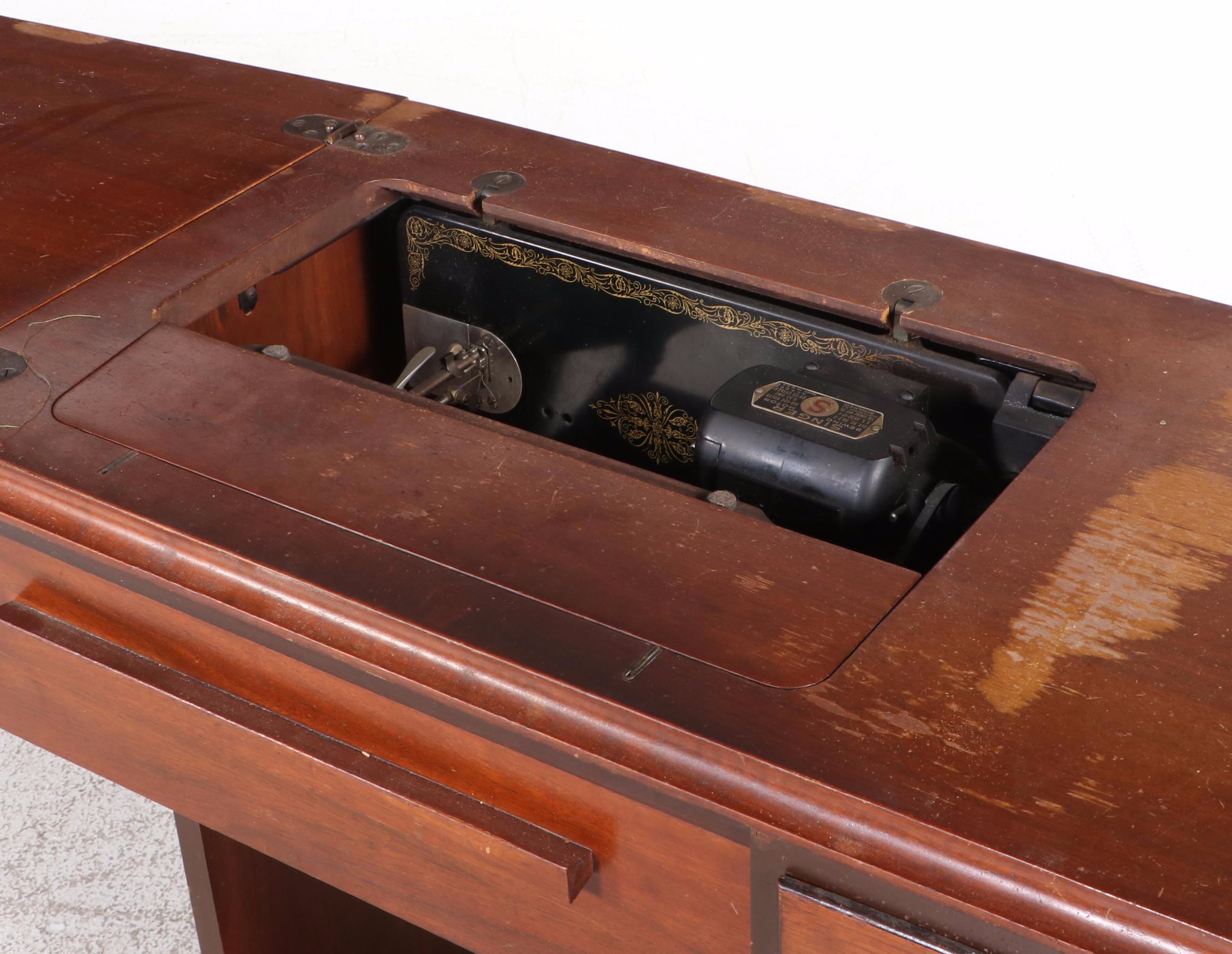 The Singer Manufacturing Co. Sewing Machine in Walnut Cabinet, Mid-20th Century