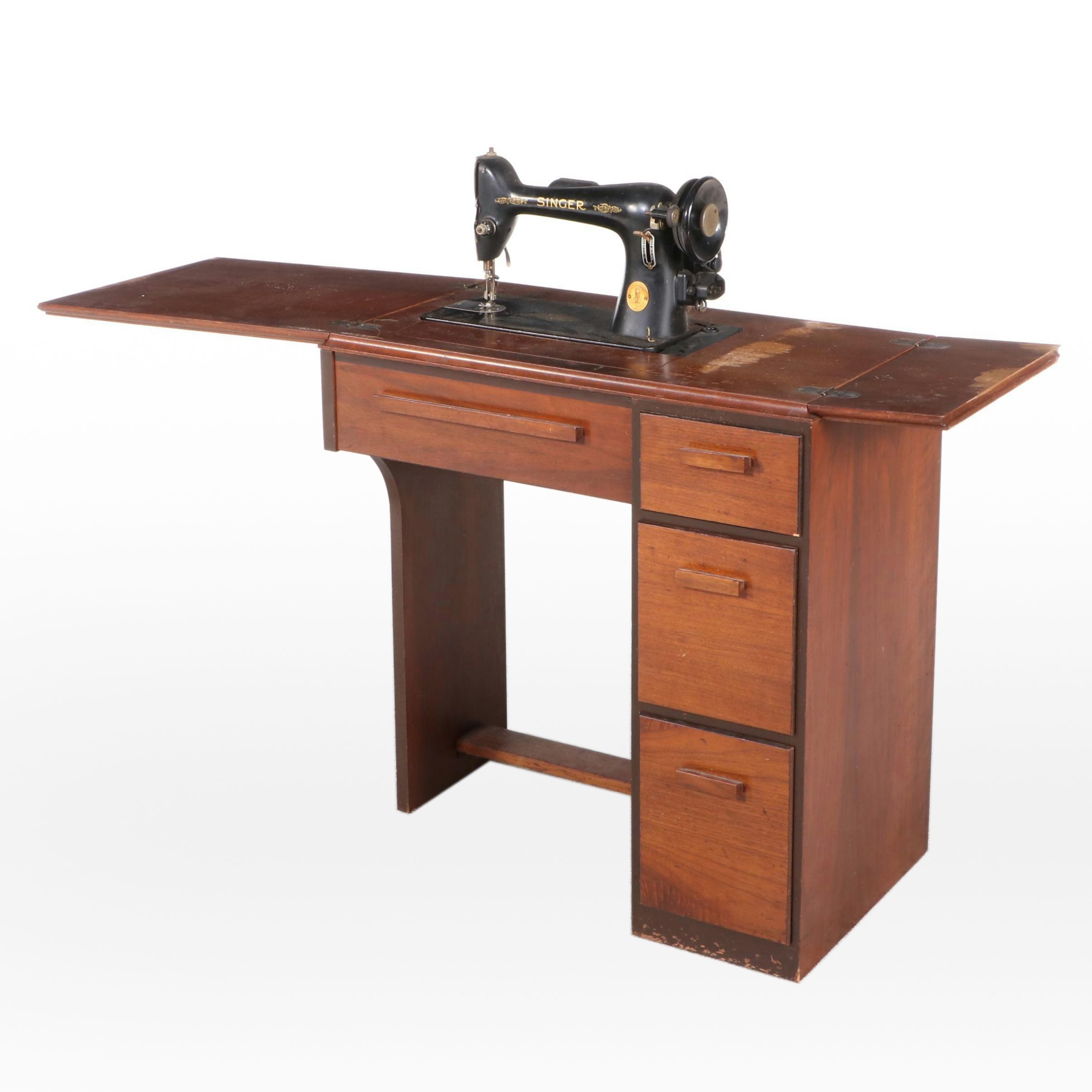 The Singer Manufacturing Co. Sewing Machine in Walnut Cabinet, Mid-20th Century