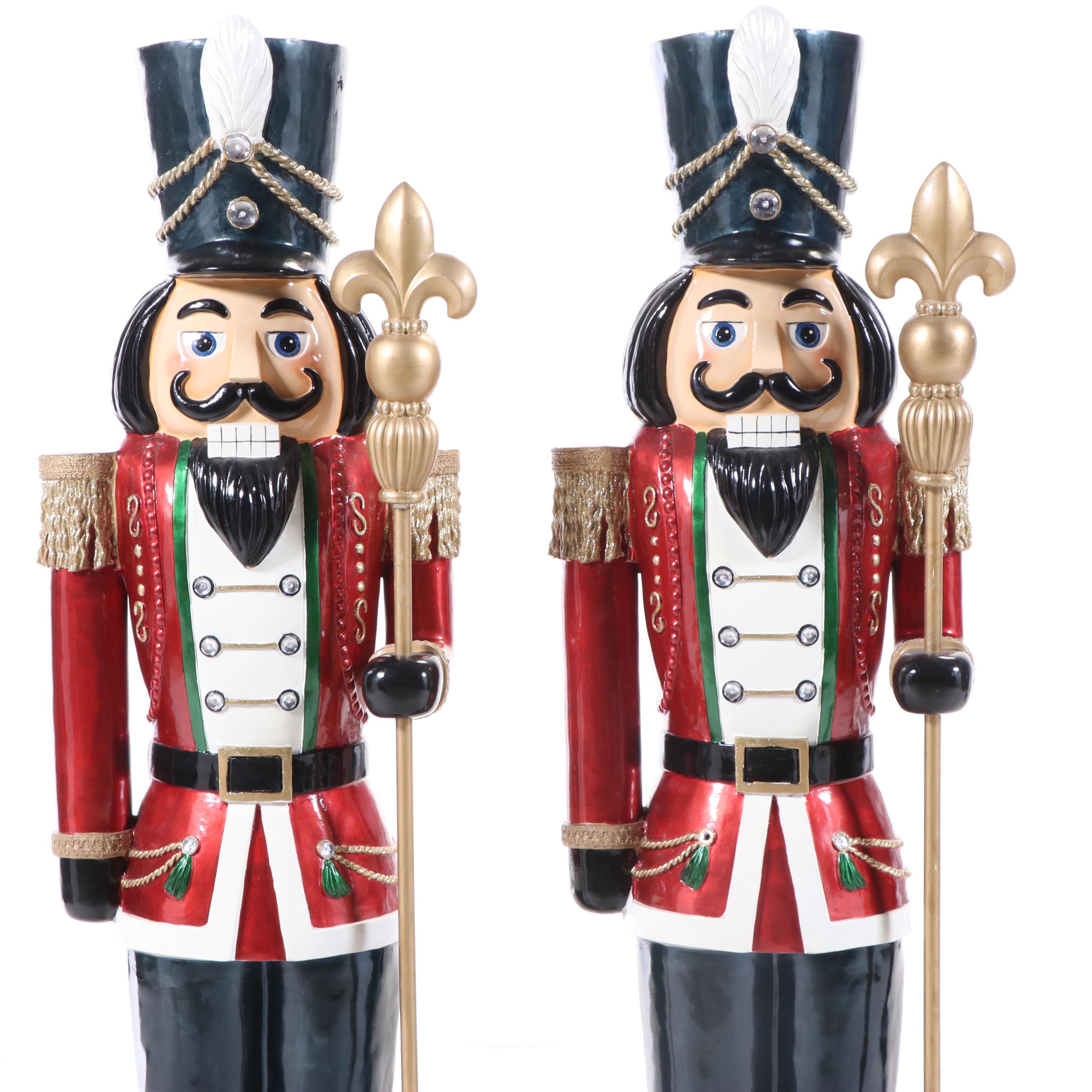 Pair of Molded and Painted Fiberglass Illuminated Life-Size Nutcracker Statues