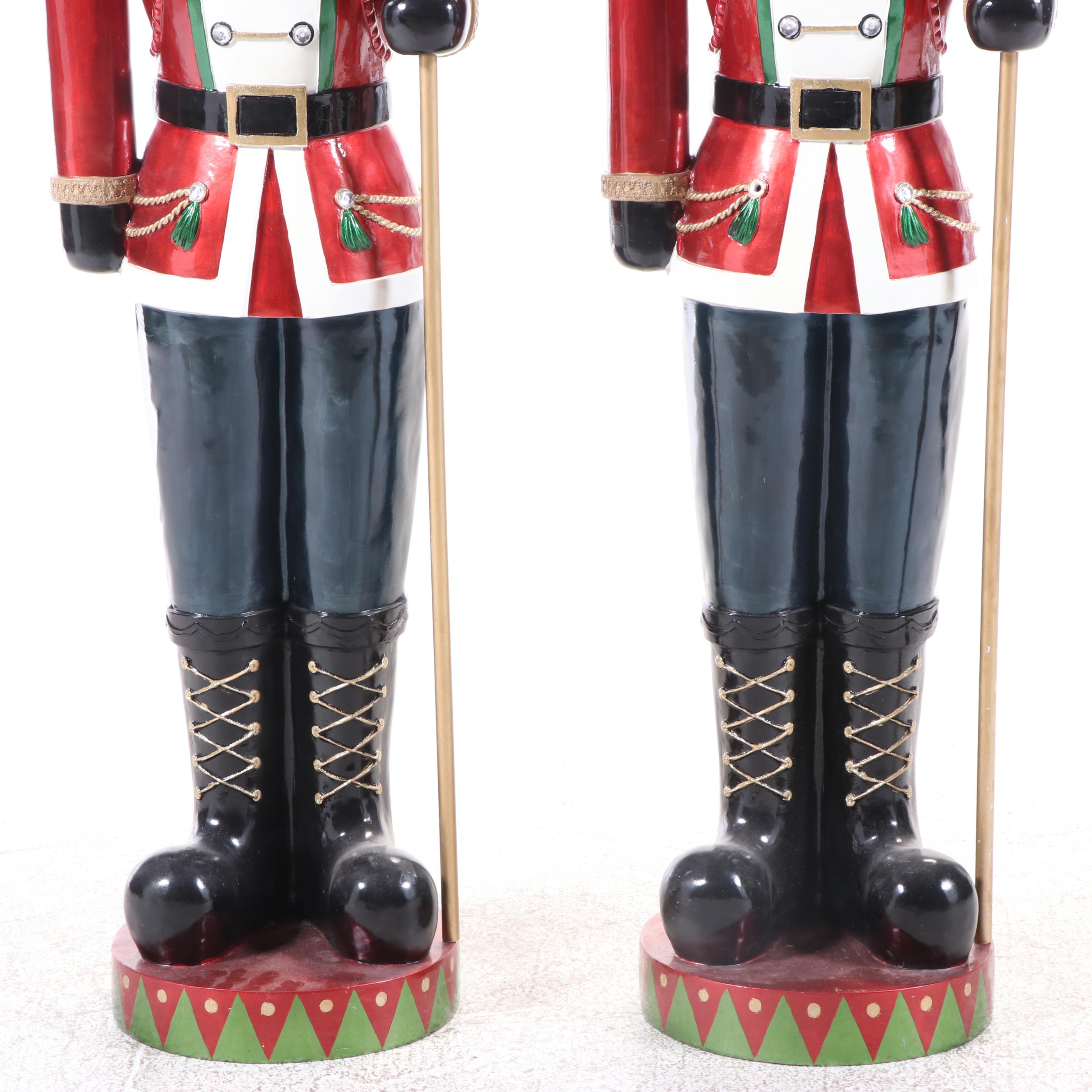 Pair of Molded and Painted Fiberglass Illuminated Life-Size Nutcracker Statues