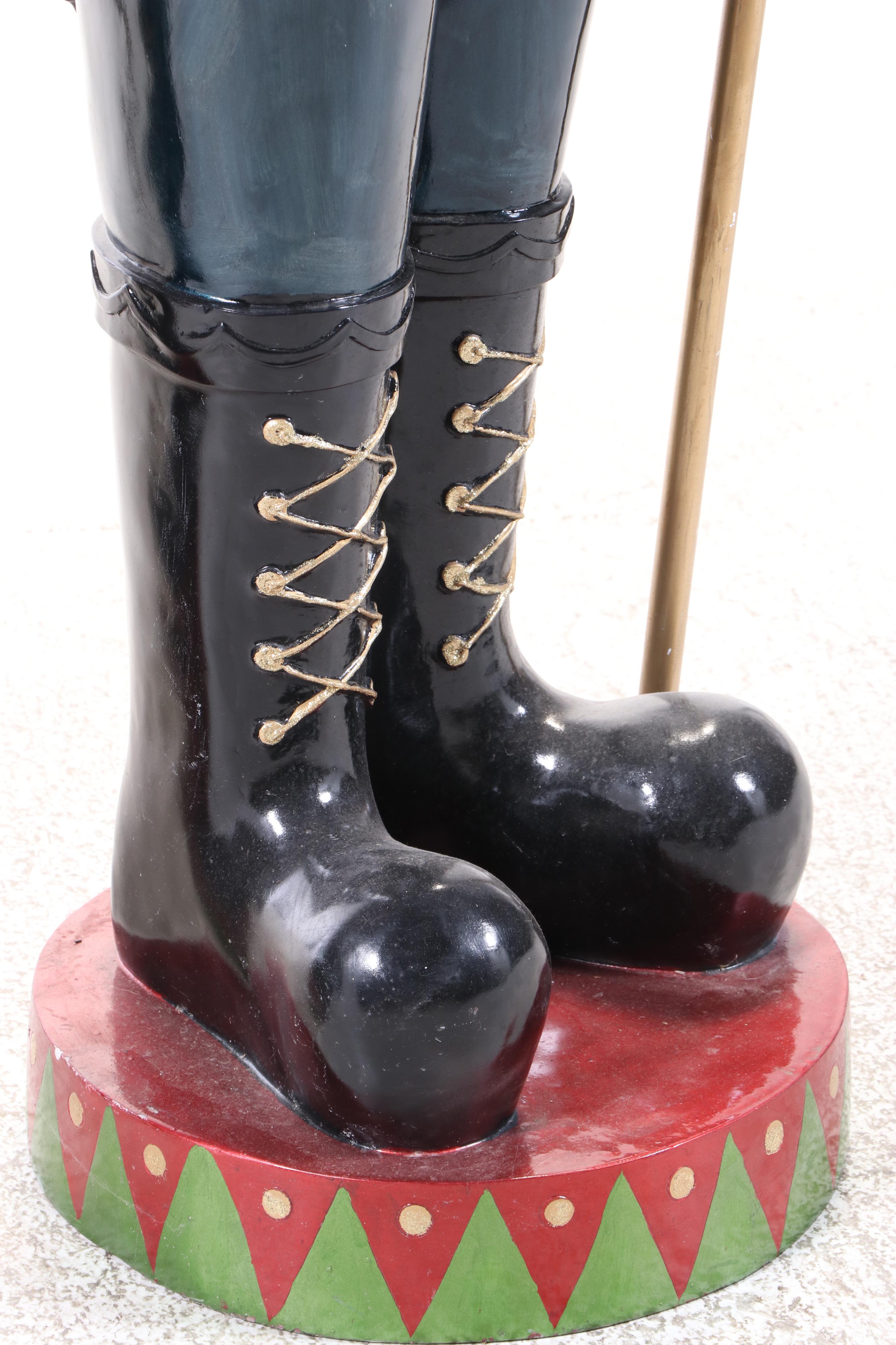 Pair of Molded and Painted Fiberglass Illuminated Life-Size Nutcracker Statues