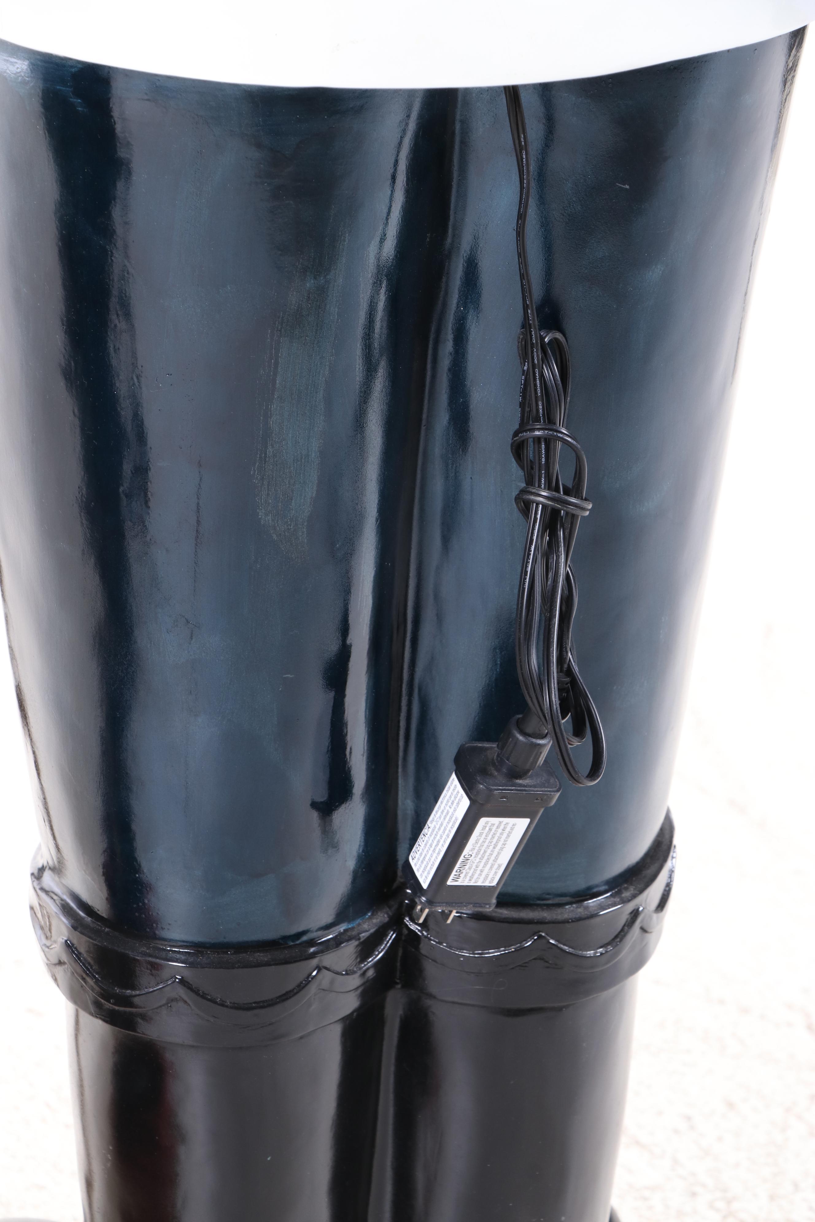 Pair of Molded and Painted Fiberglass Illuminated Life-Size Nutcracker Statues