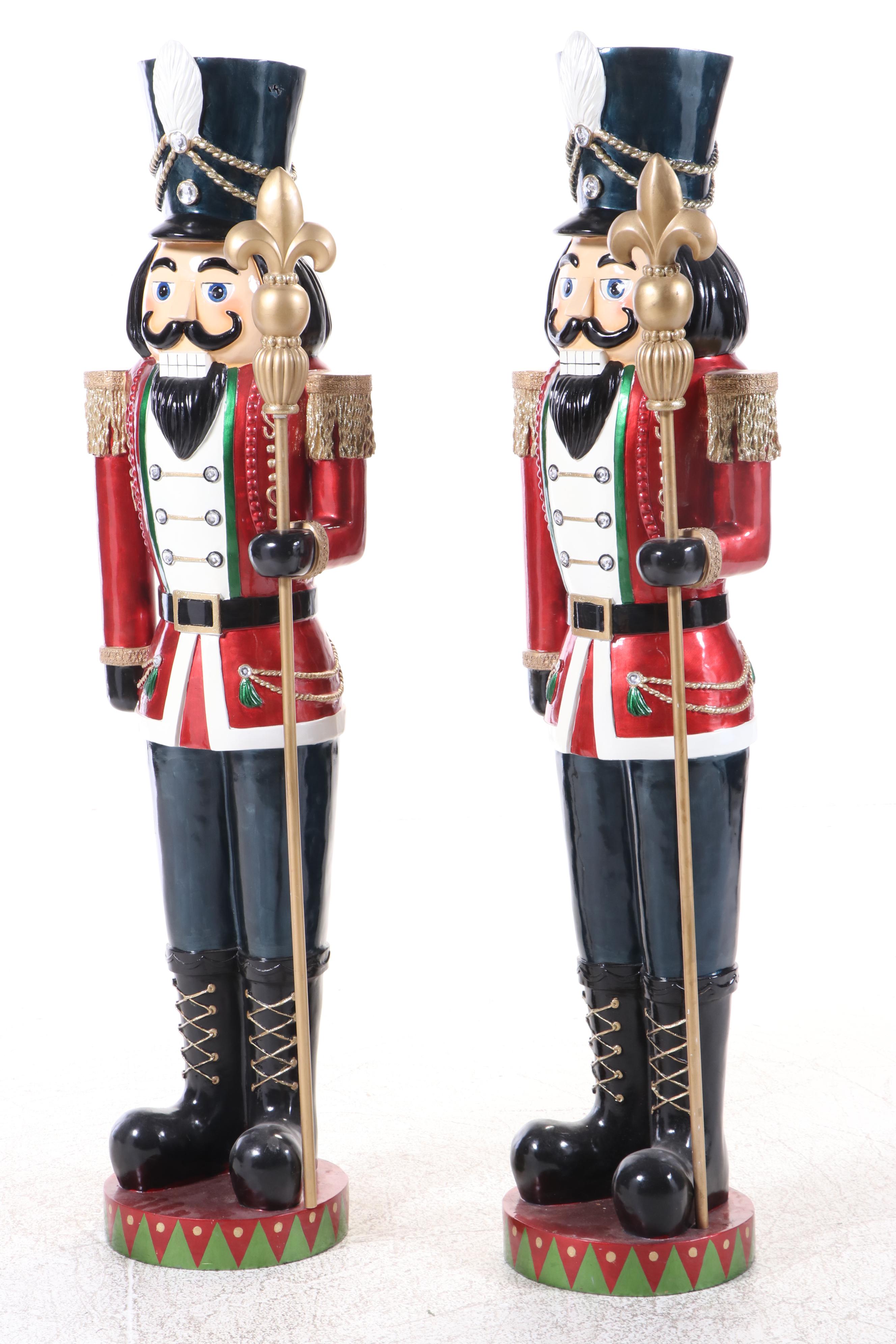 Pair of Molded and Painted Fiberglass Illuminated Life-Size Nutcracker Statues