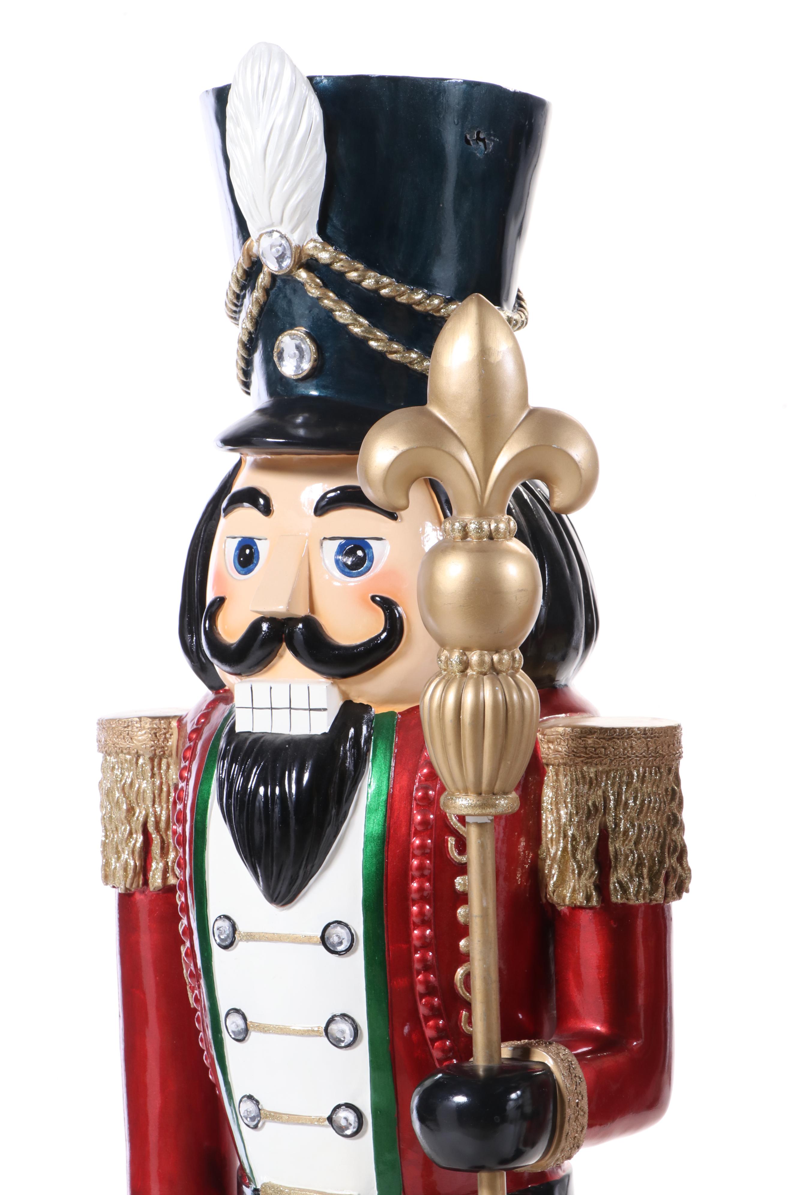 Pair of Molded and Painted Fiberglass Illuminated Life-Size Nutcracker Statues