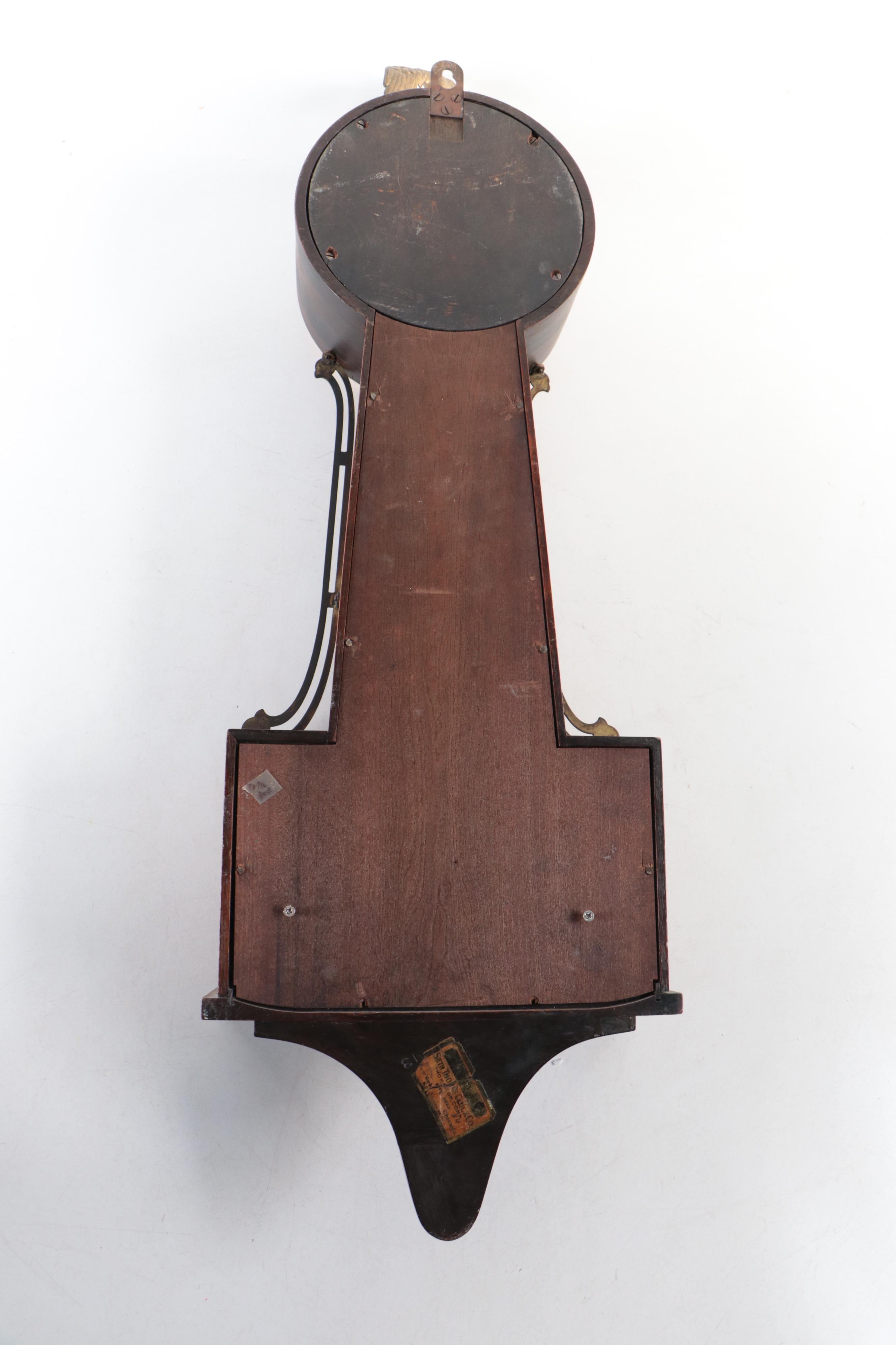 Seth Thomas Wooden and Reverse Painted Glass Banjo Clock, Early 20th Century