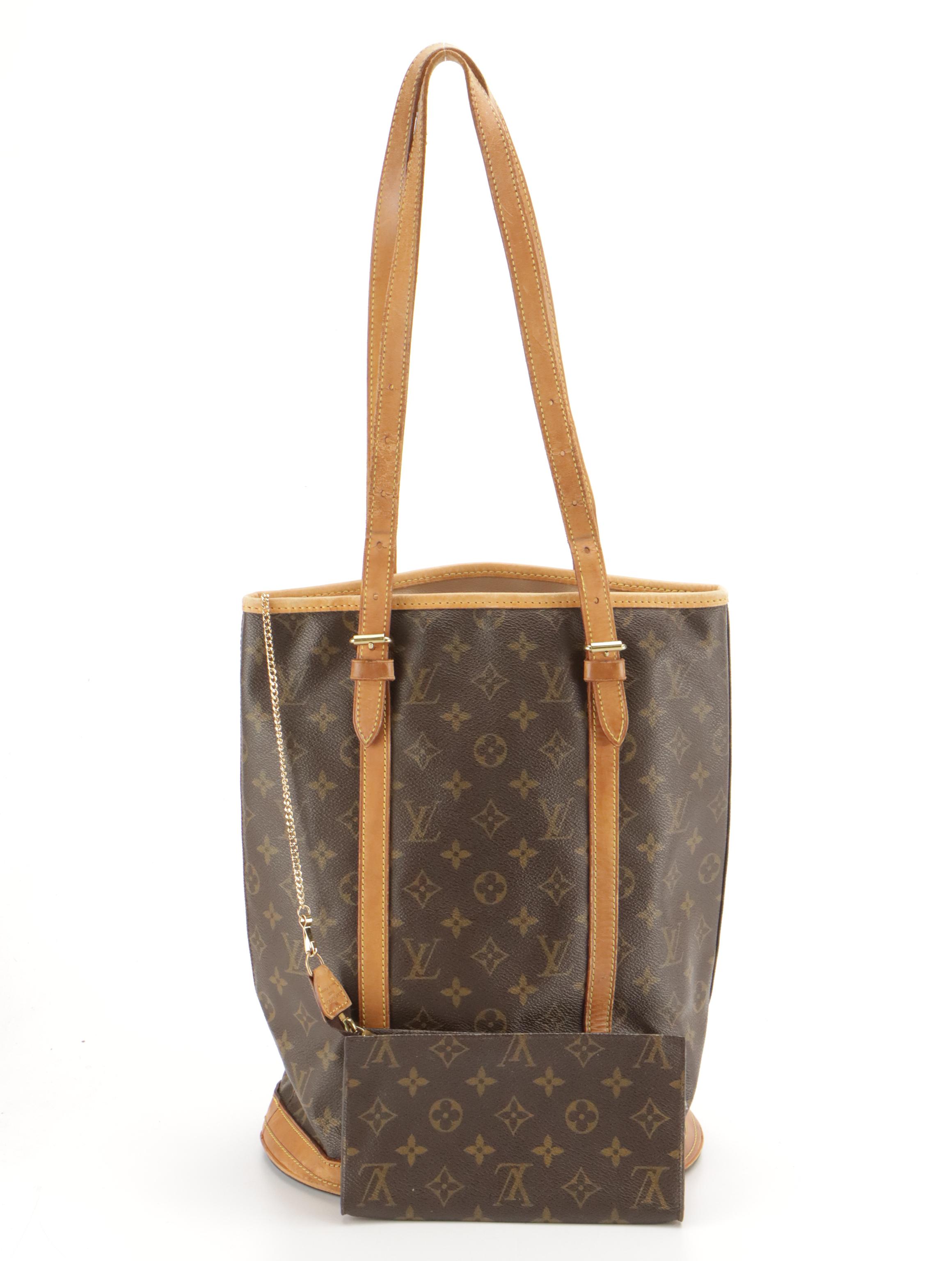 Louis Vuitton Bucket Bag in Monogram Canvas and Leather with Zip Pouch