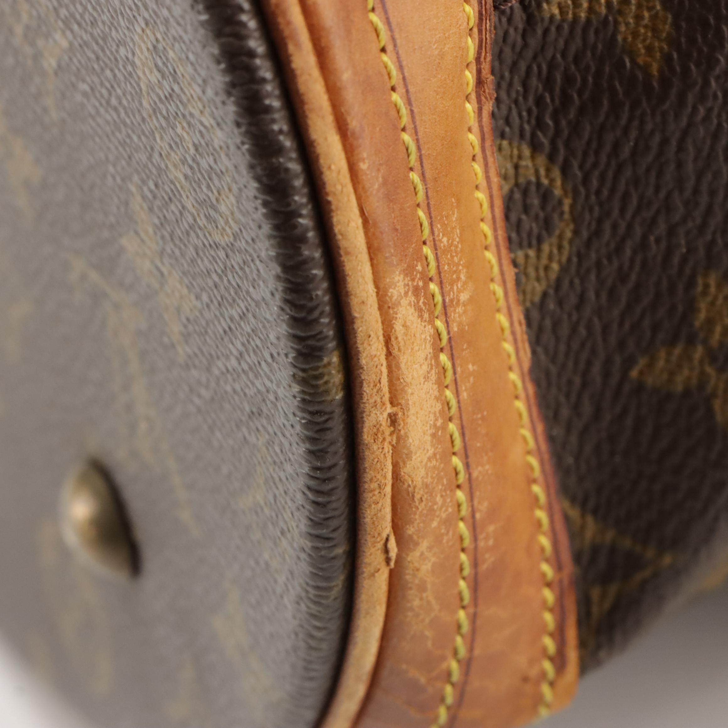 Louis Vuitton Bucket Bag in Monogram Canvas and Leather with Zip Pouch