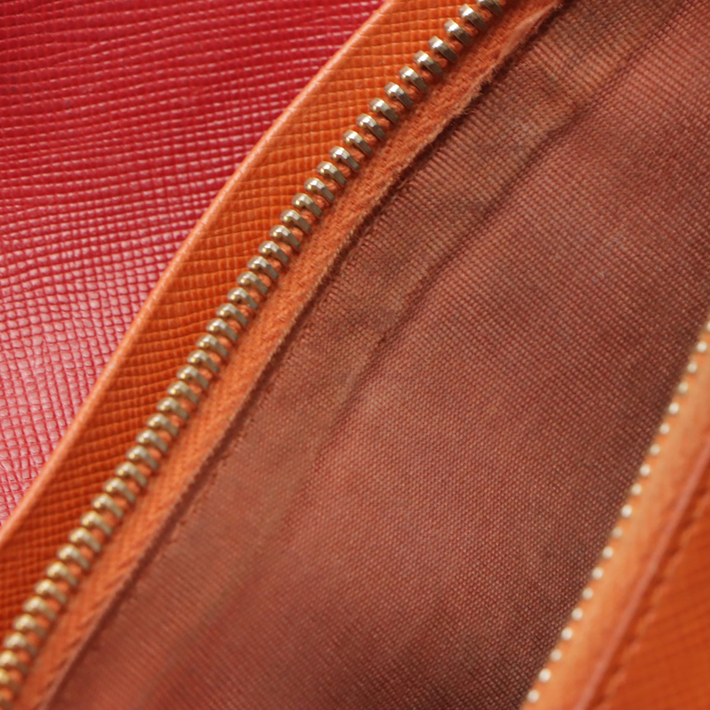 Prada Front Flap Long Wallet in Red and Orange Saffiano Wave Leather