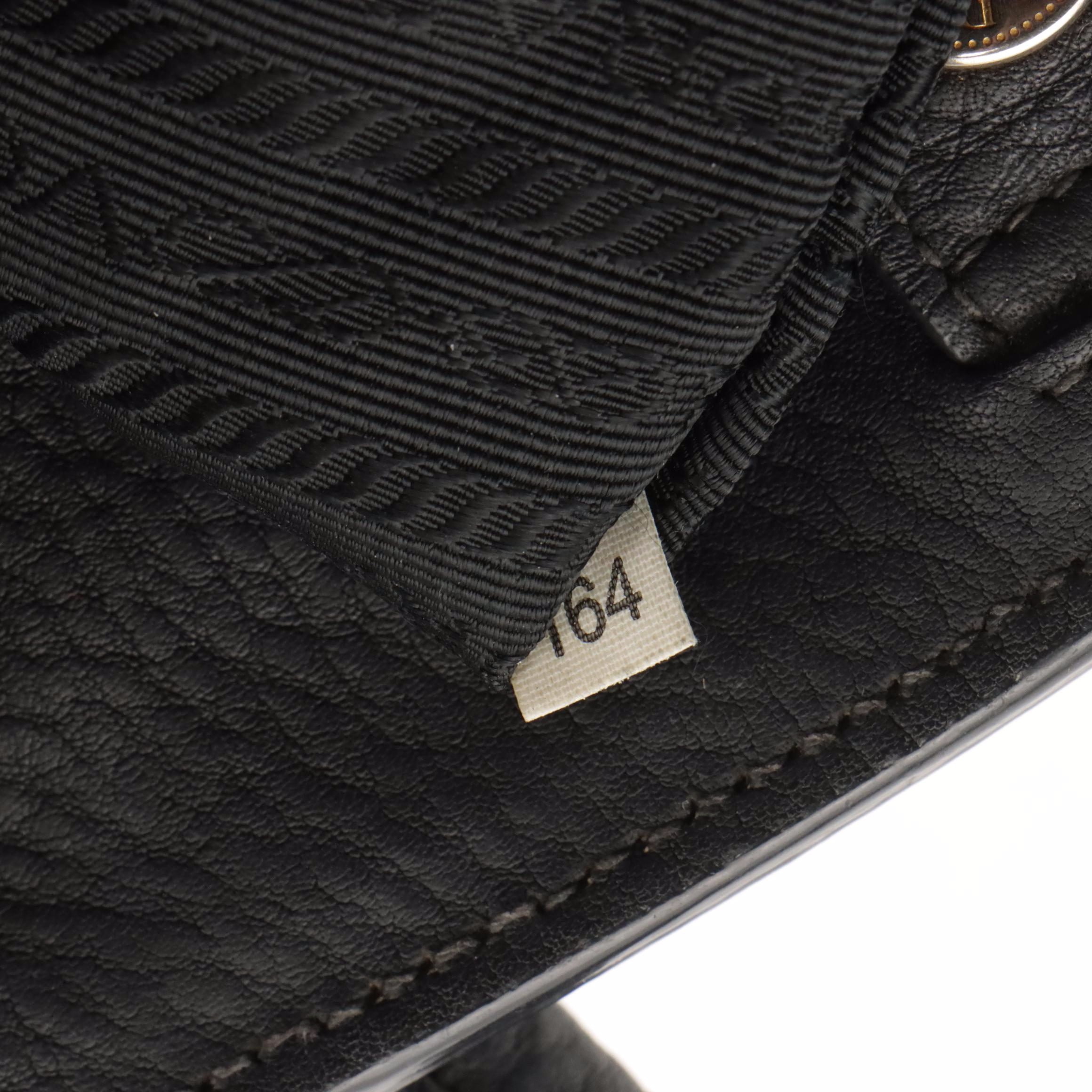 Prada Wing Two-Way Tote Bag with Front Pocket in Black Vitello Daino Leather