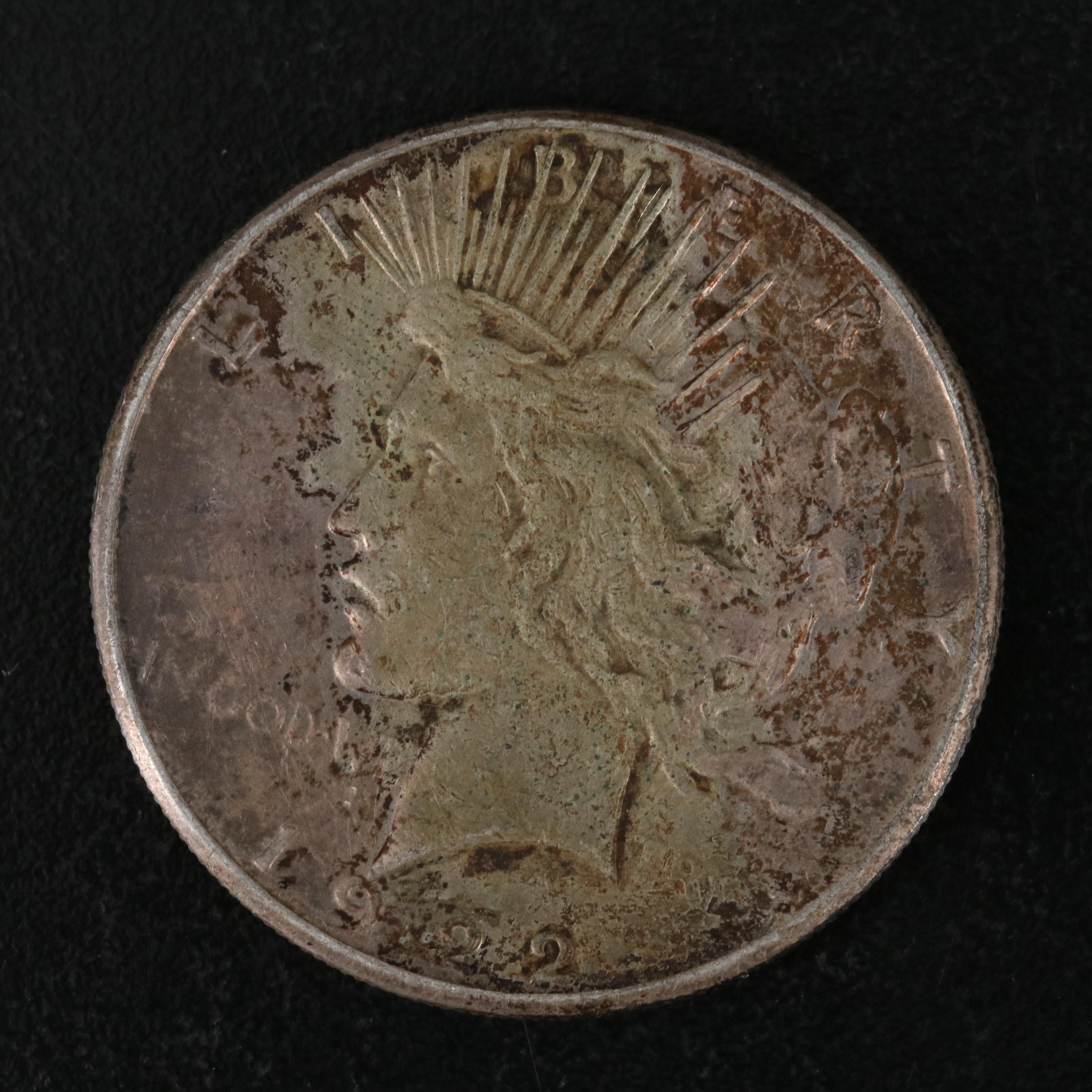 Five Peace Silver Dollars