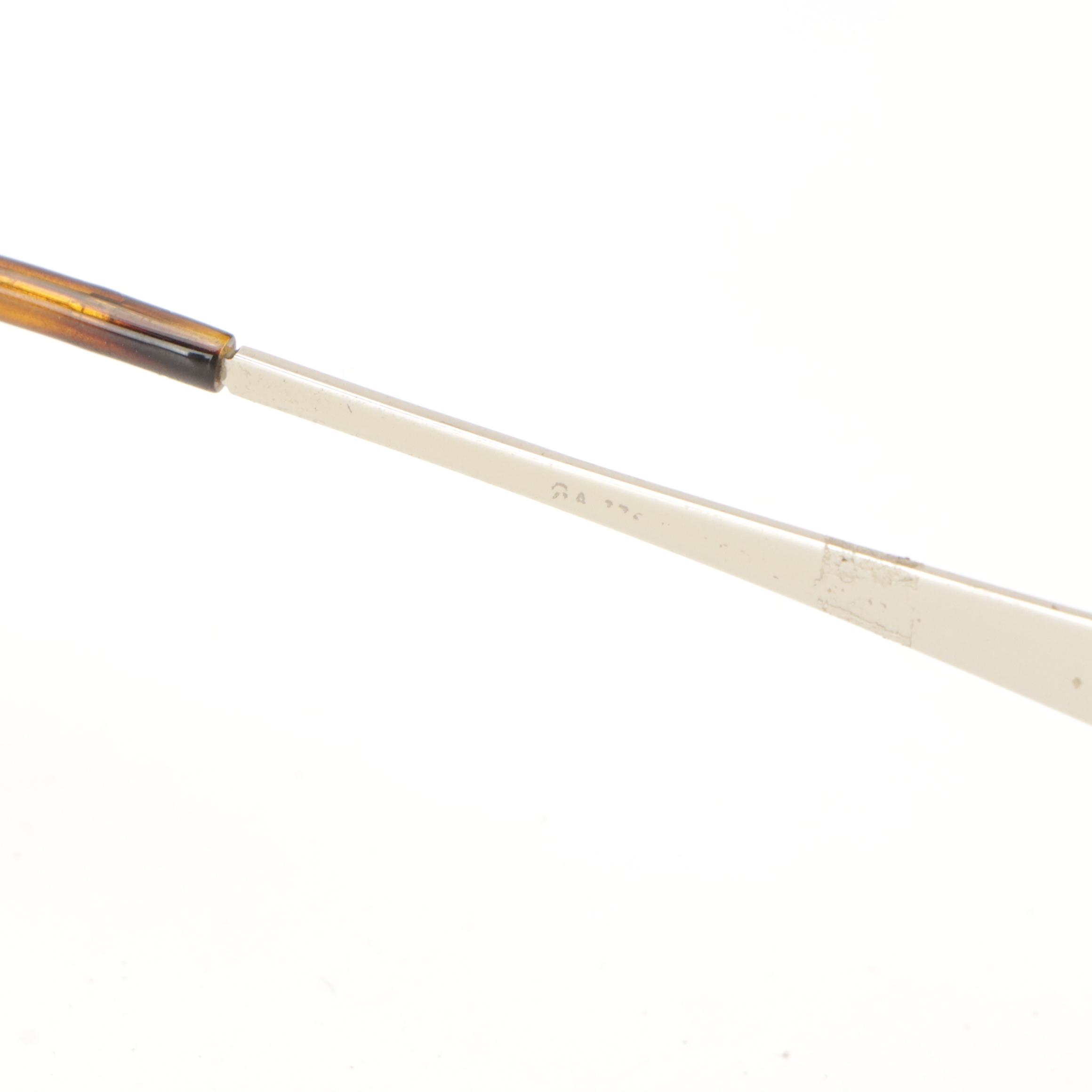 Prada VPR19I and Giorgio Armani Prescription Glasses