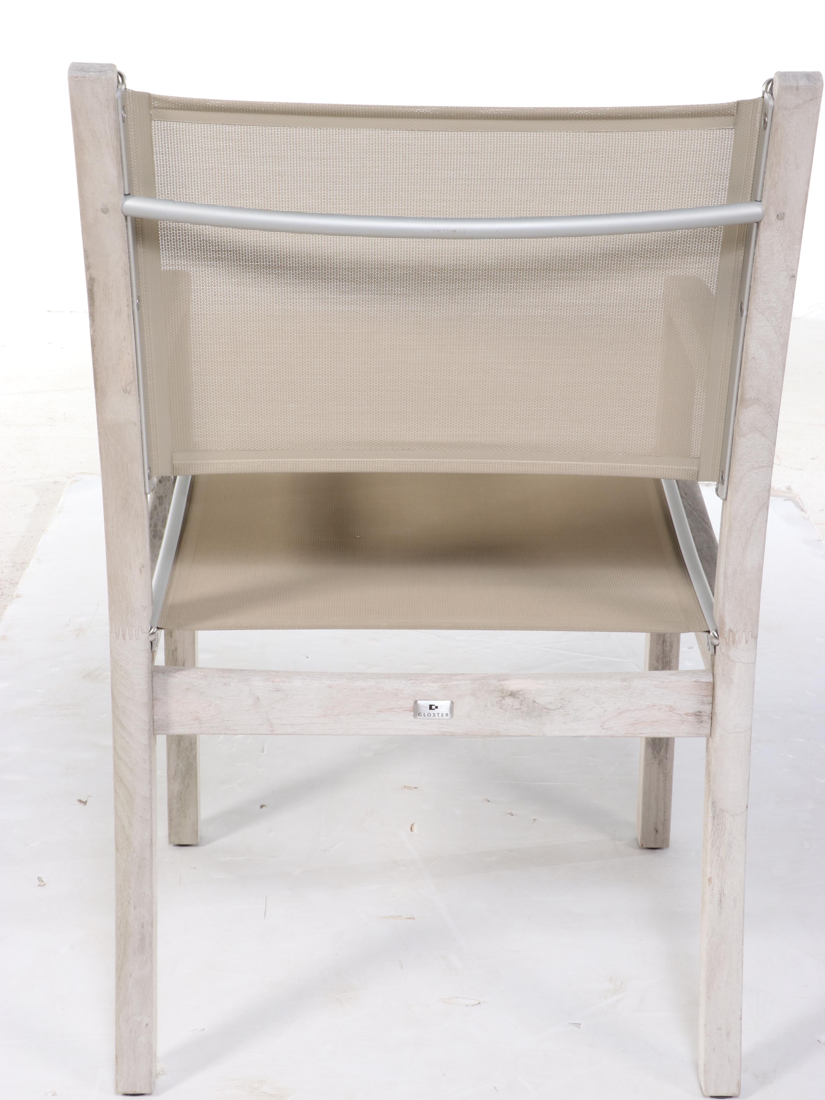 Gloster Teak Patio Dining Table, Four Chairs, and Side Table