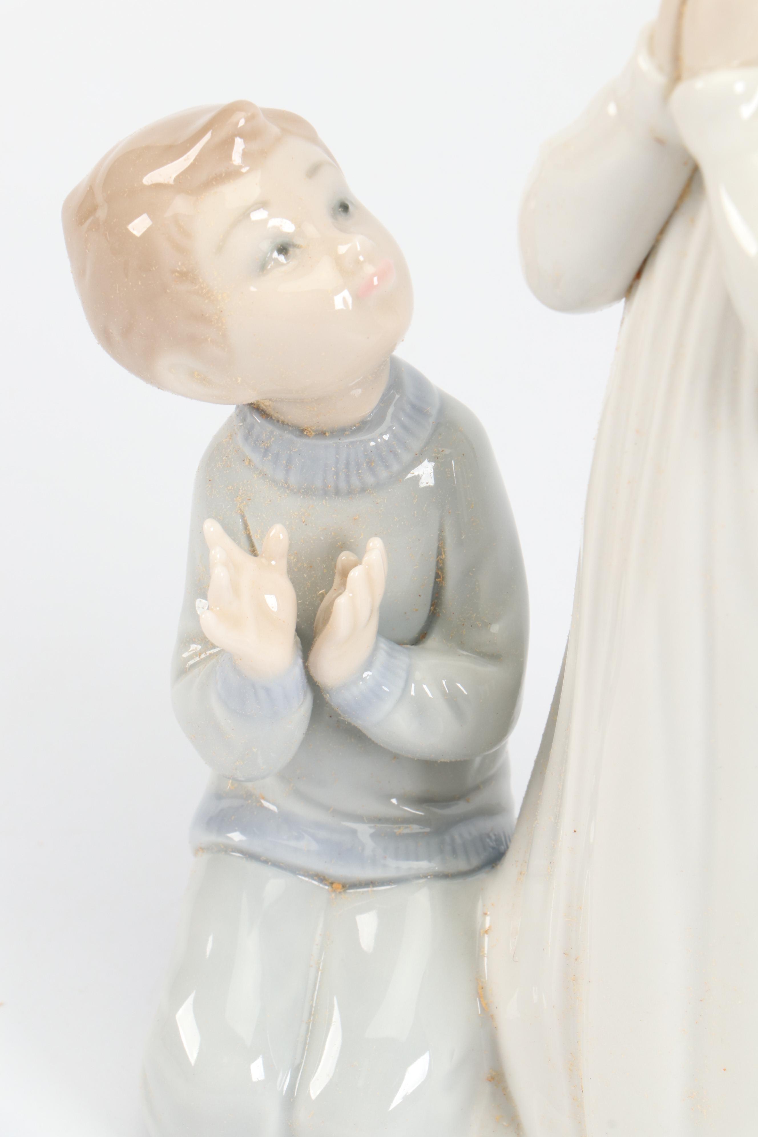 Lladró "Teaching to Pray" Porcelain Figurine Designed by Vicente Martínez