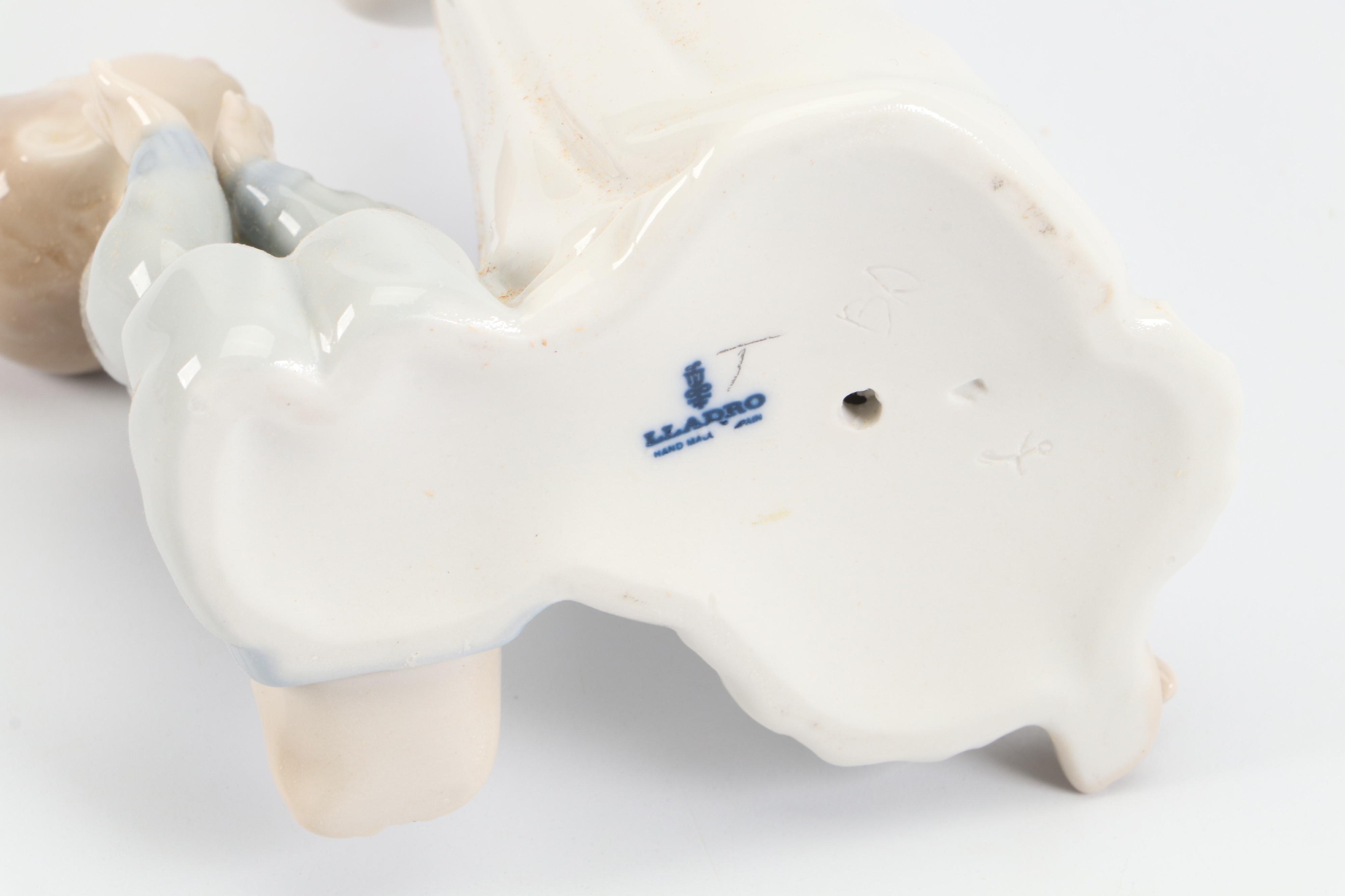 Lladró "Teaching to Pray" Porcelain Figurine Designed by Vicente Martínez