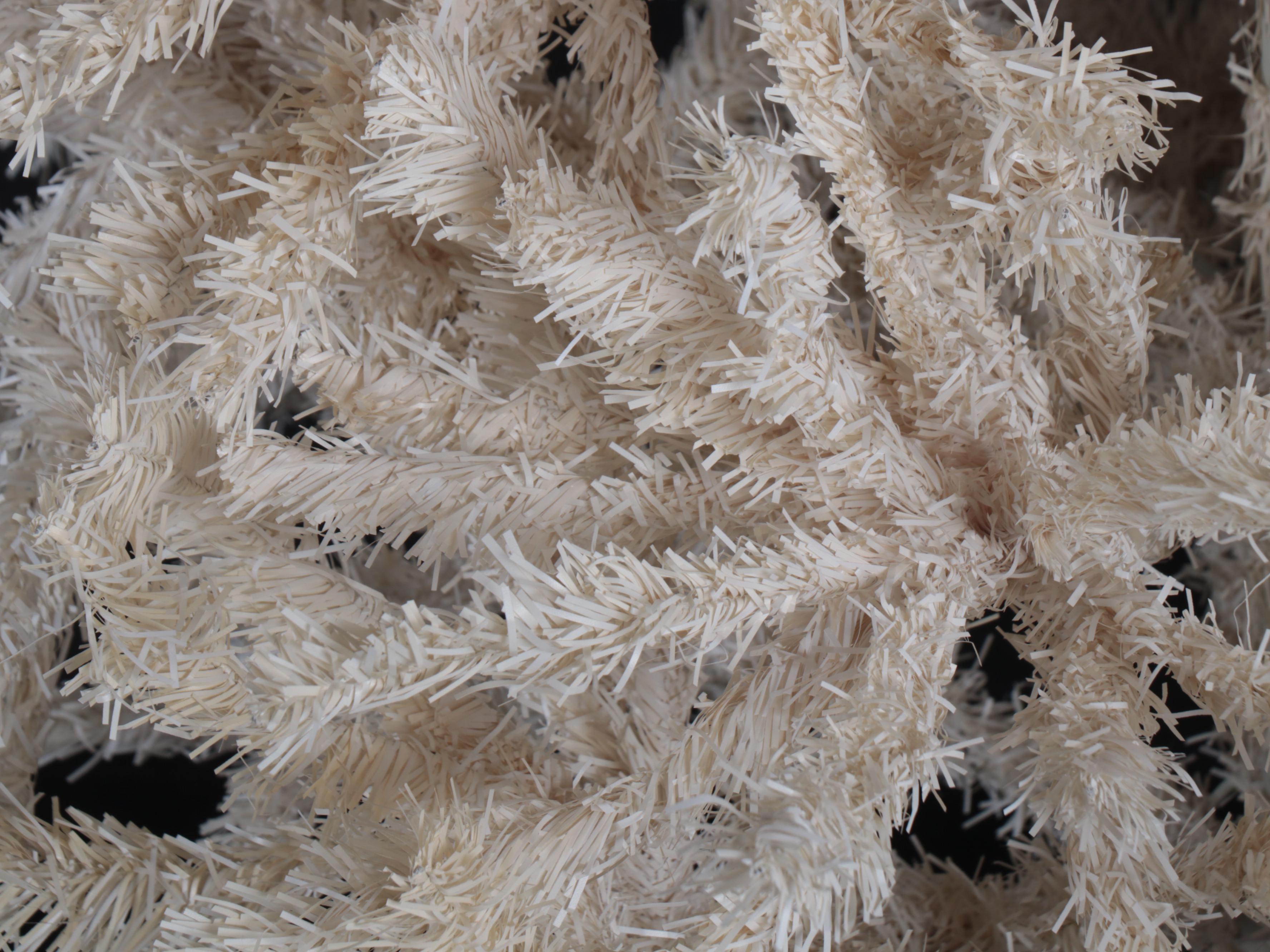 Large and Small Artificial Christmas Trees in White